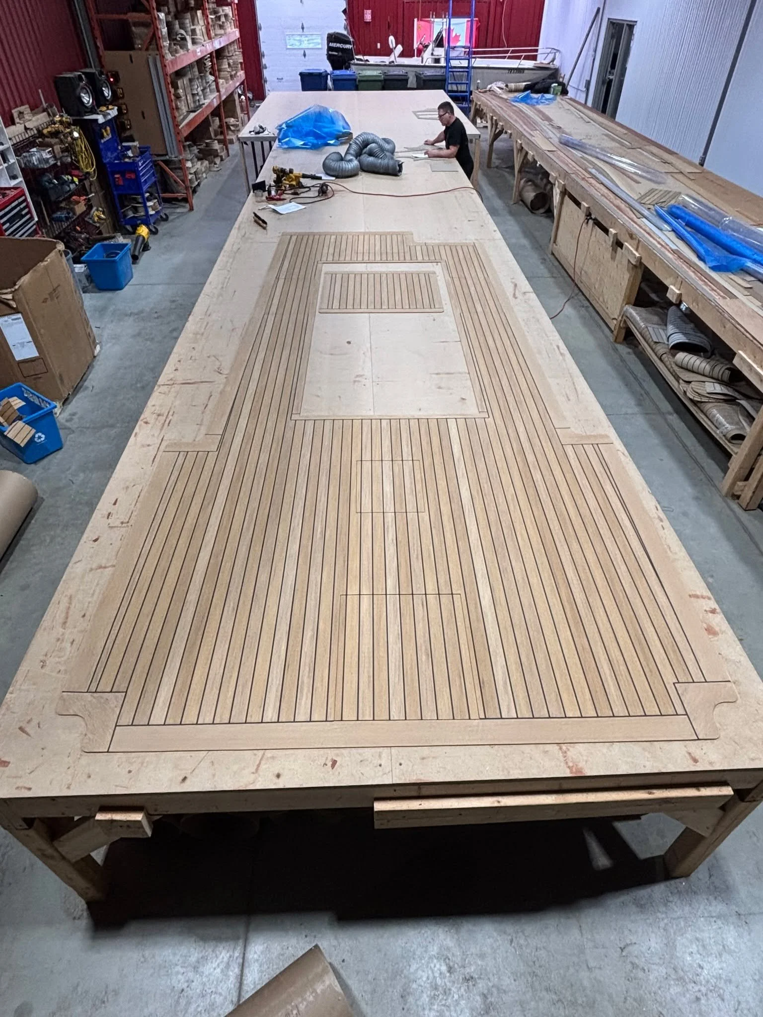 Is it teak or is it PERMATEEK ? Feel free to examine closely and attempt to distinguish the difference! This PERMATEEK deck will be installed in a custom build on Cape in a couple of weeks. Fabricated by our Canadian partners, this deck will be laid 