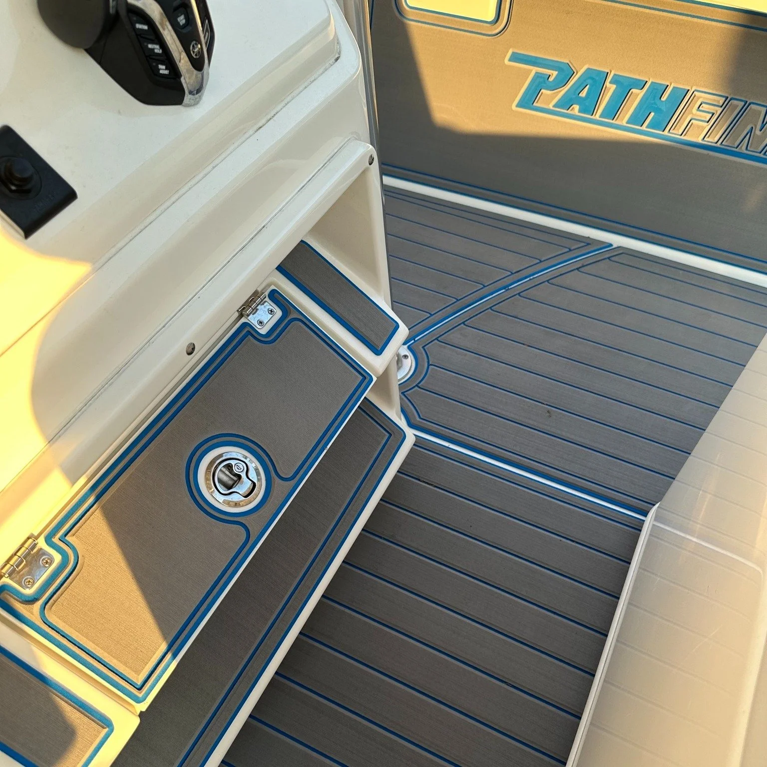 This Pathfinder is getting the full treatment! We've installed brand-new MarineMat decking in a sharp Aegean Blue and Slate Gray color combination, giving the boat a fresh, modern look while adding comfort, durability, and superior traction on the wa