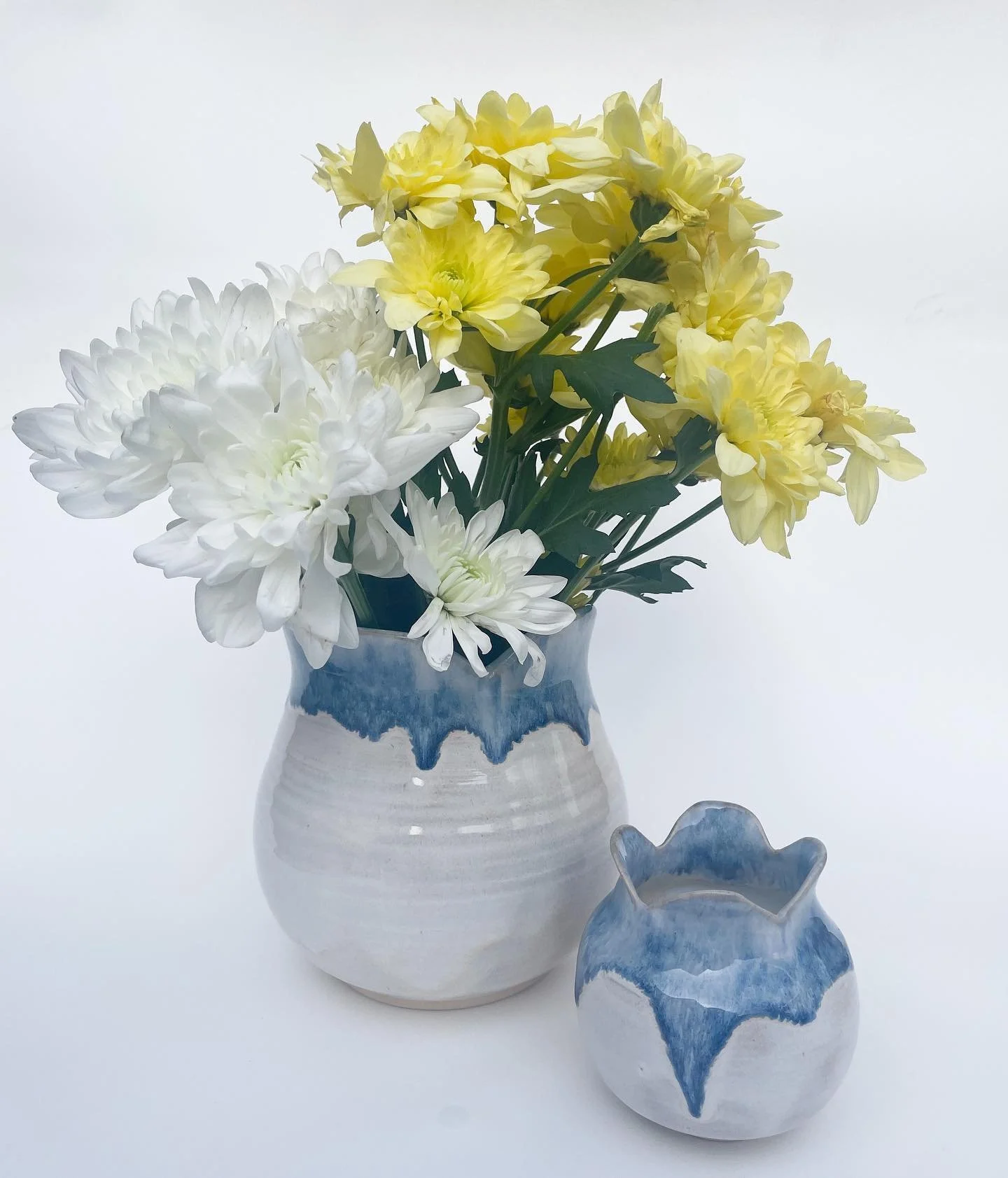 New vases with a touch of floating blue glaze! 
.
.
.
.
.
#clay #pottery #glaze #ceramics #spring #gardenflowers