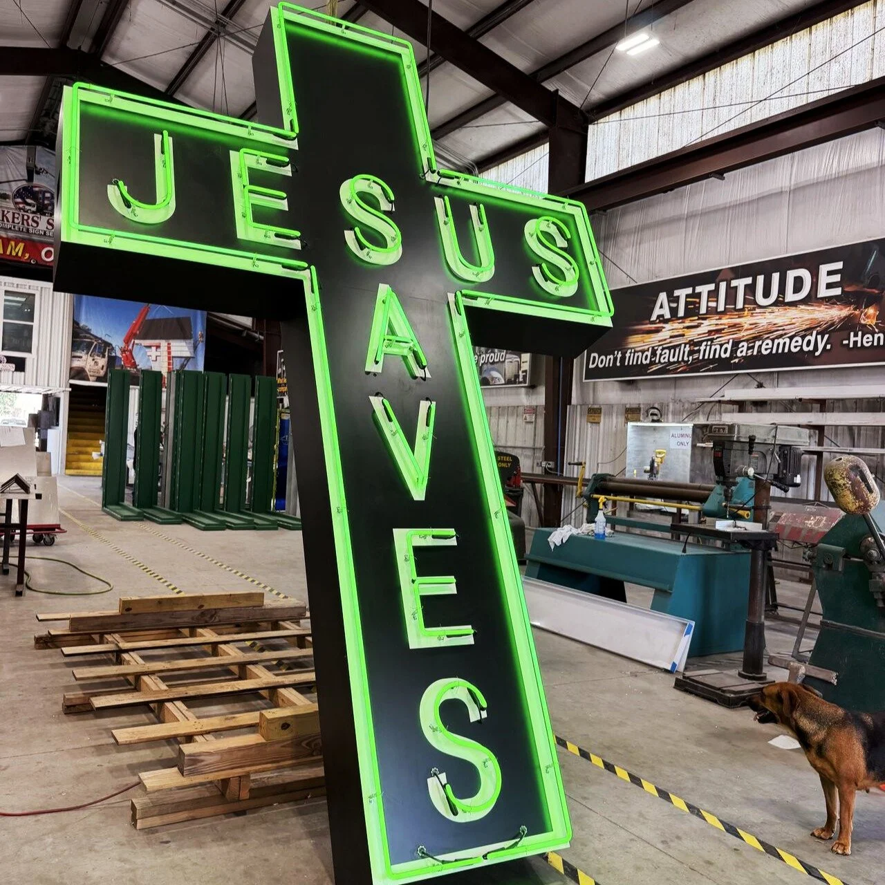 Something special about this cross standing in the shop. Drapped in a classic green #neon with the simple words of #salvation!... 🙏 

"The Light Shines in the Darkness." - John 1:5