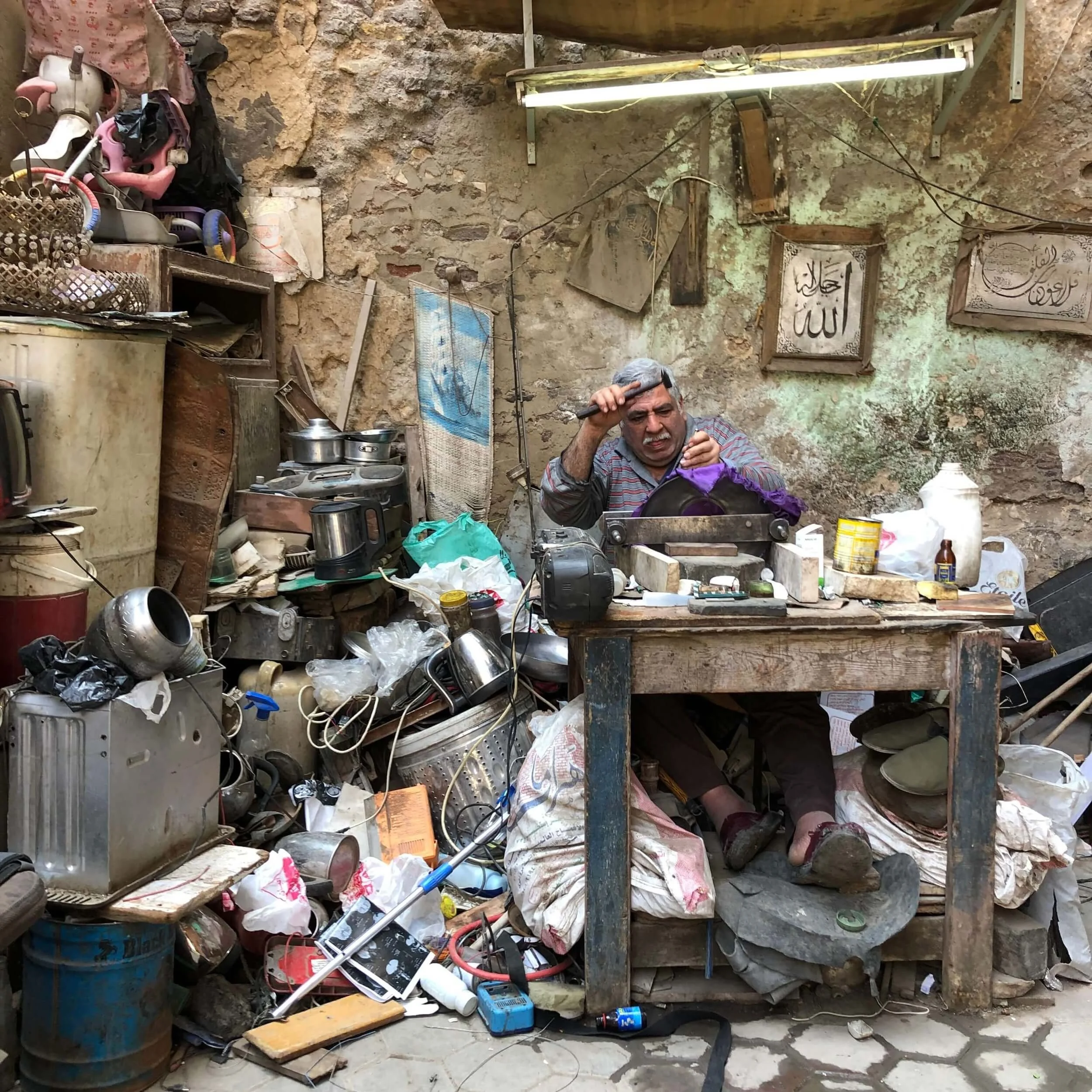 Silver Smith working on Cairo street, captured while filming in Egypt
