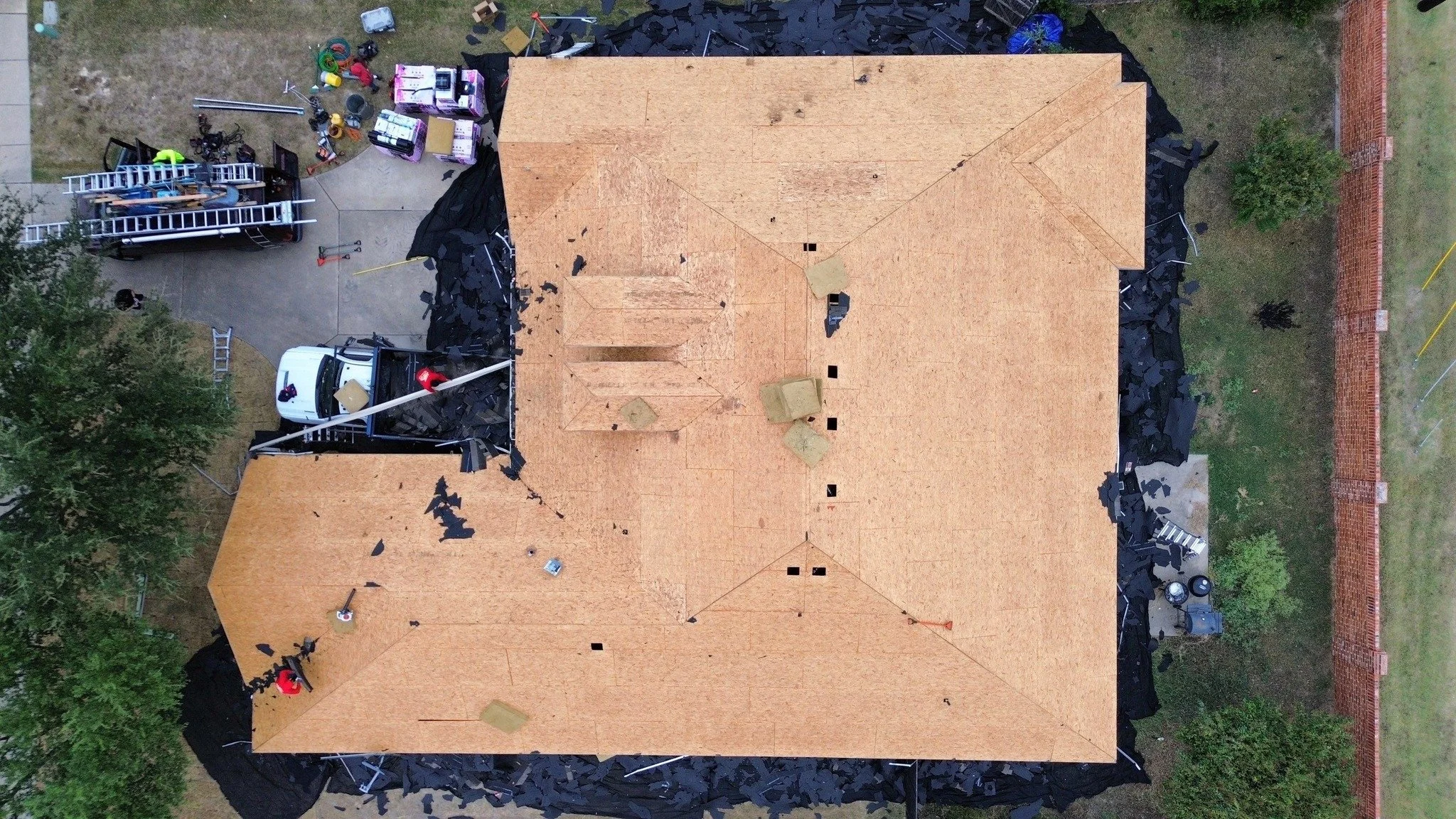 When we strip a roof, we don&rsquo;t just stop at the top layer; we go all the way down to the decking.  We&rsquo;ve encountered multiple roofs with two, sometimes even three, layers of old felt hiding underneath.

It might look fine from the surface