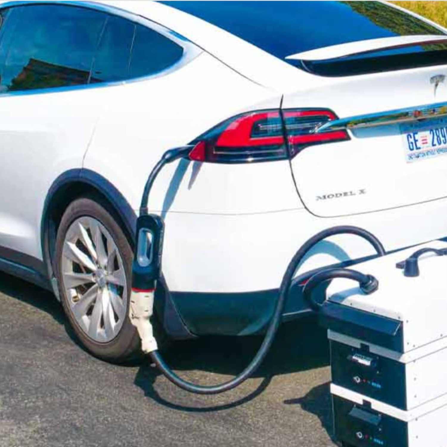 Innovative Absolute Power™ Mobile Charging System charging a Tesla