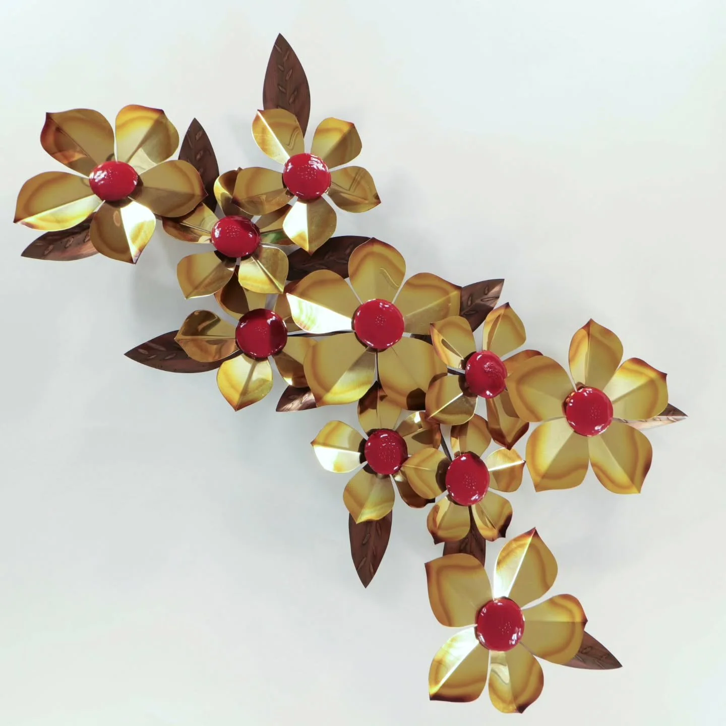 Torch Art Ltd., Edmonton 
This mid-century floral wall sculpture embodies Prairie modernism, forged from welded metal with radiant enamel centers. Produced by Torch Art Ltd., an Edmonton studio active in the 1960s&ndash;70s, it reflects a time when l