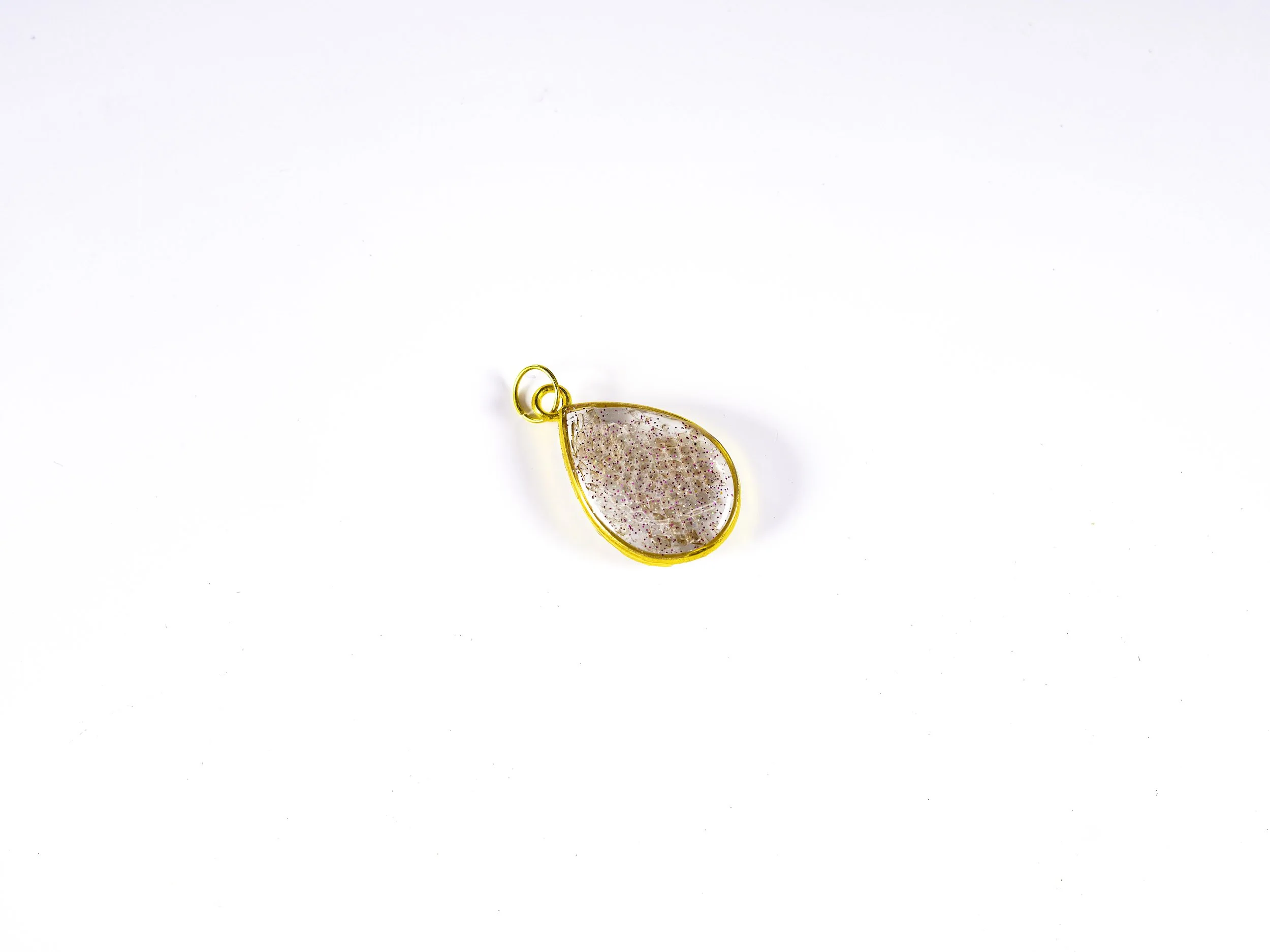 Tear Drop Pendant with Snake Shed and confetti glitter