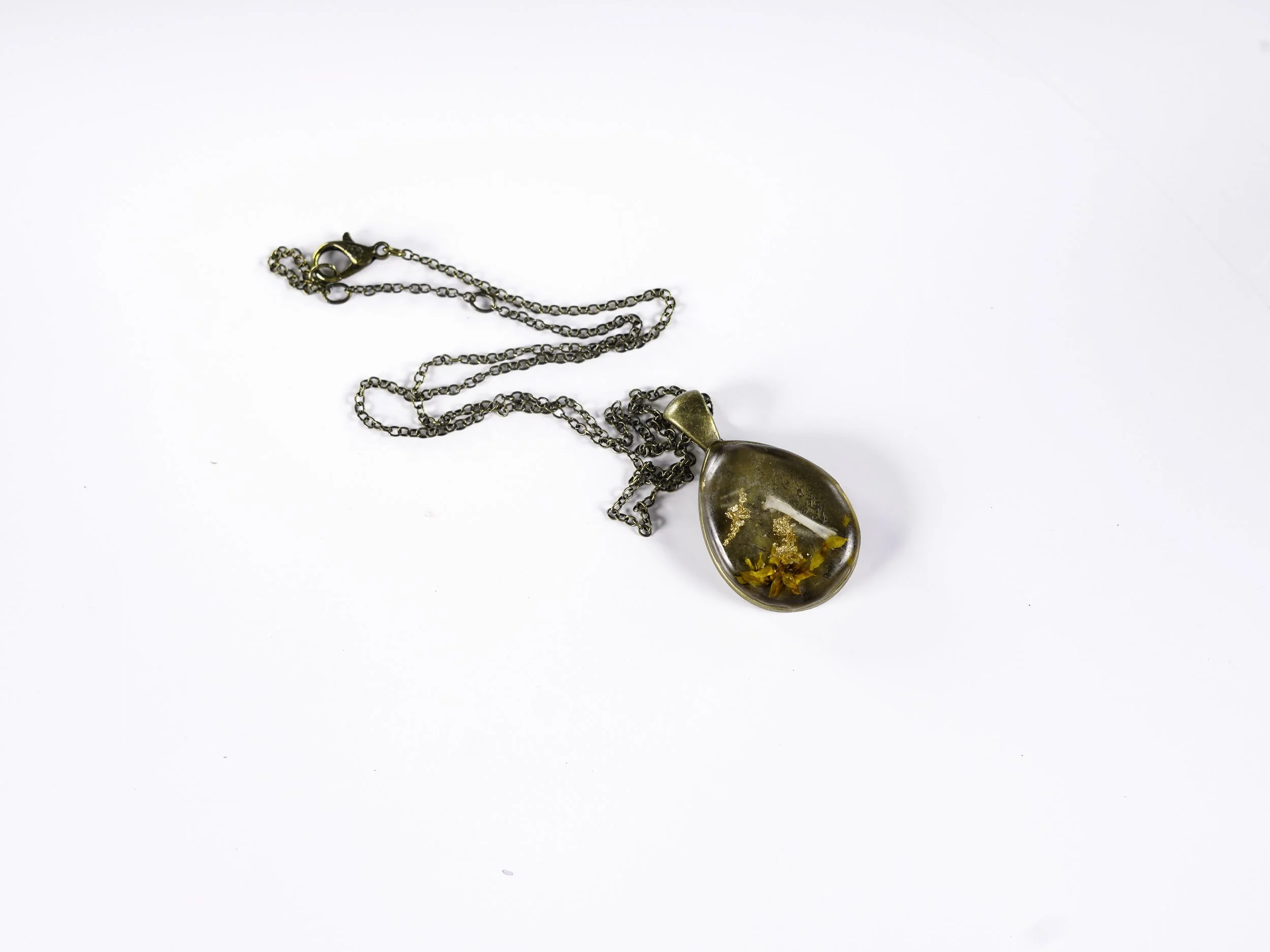 Pendant with Rodent Bones and Gold Flakes