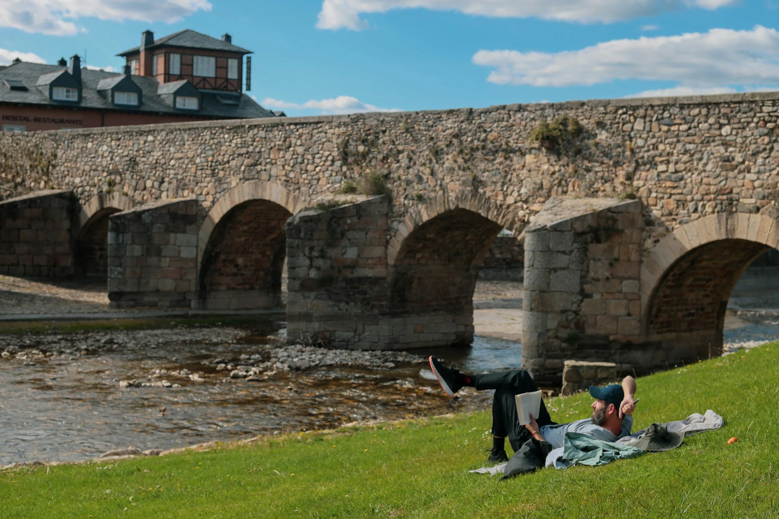 man reading in galicia spain