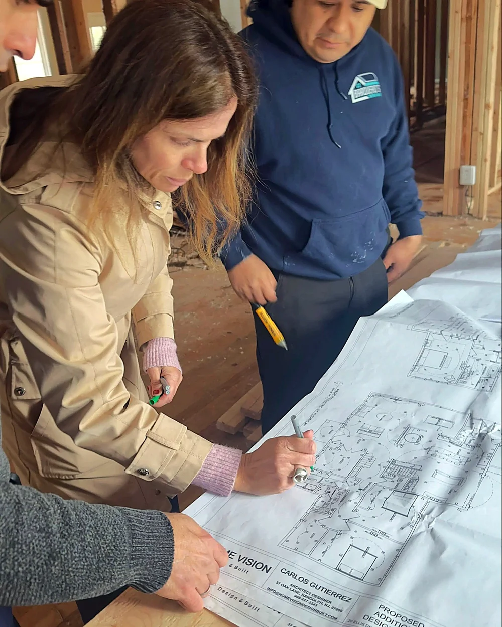 Reviewing the floor plans on site
