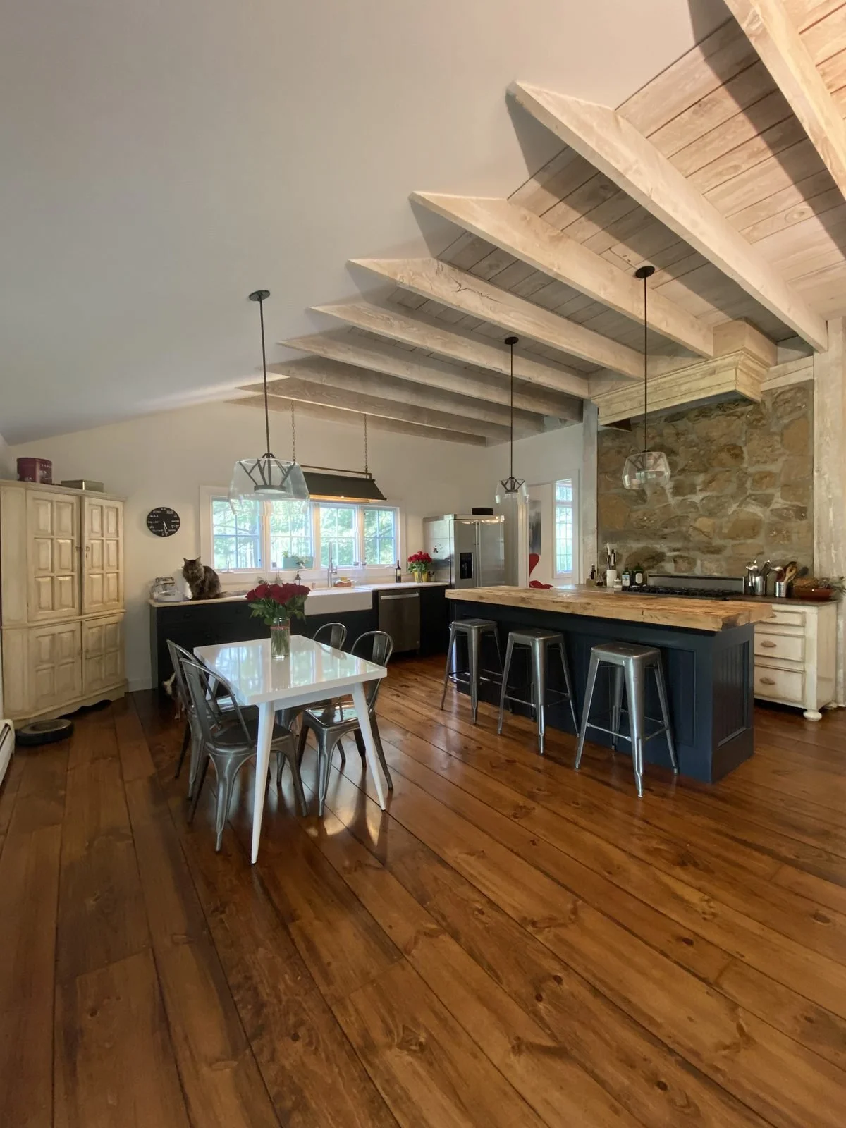 Farmhouse kitchen with whitewashed beams, an original stone wall and a reclaimed wood island, English Farmhouse in Basking Ridge