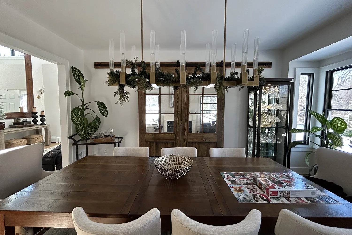 Dining room with a solid wood table and a brass and glass chandelier, Basking Ridge