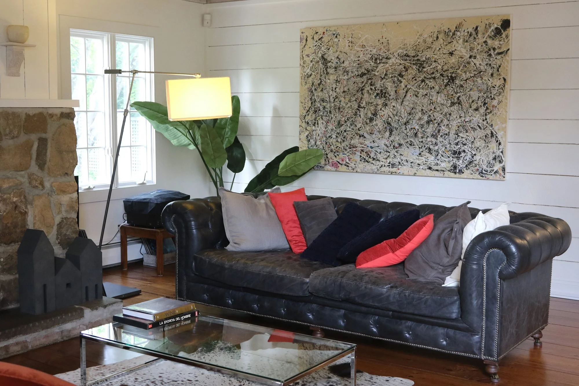 Leather chesterfield and statement art