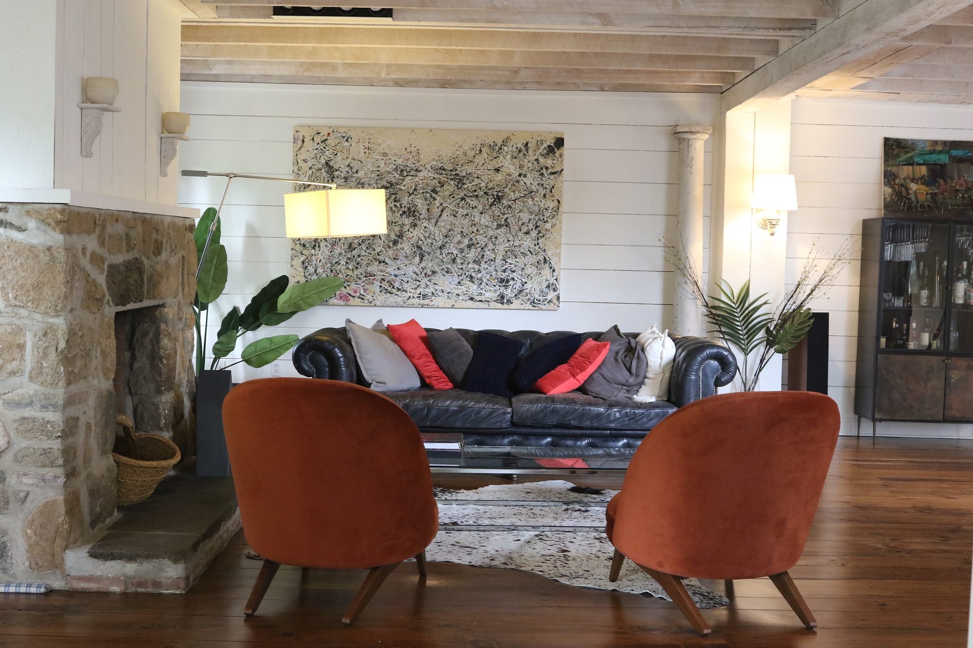 Living room around the original stone fireplace