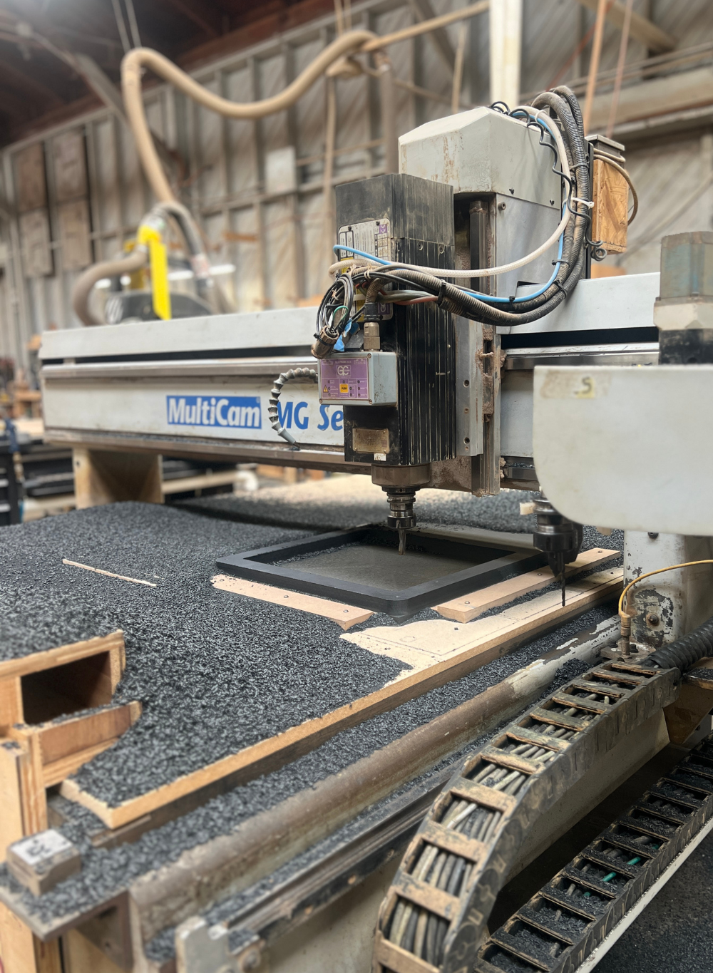 A shot of the Fern & Roby Archival Turntable plinth being machined out of solid Richlite at Tektonics Design  Group in Richmond Virginia
