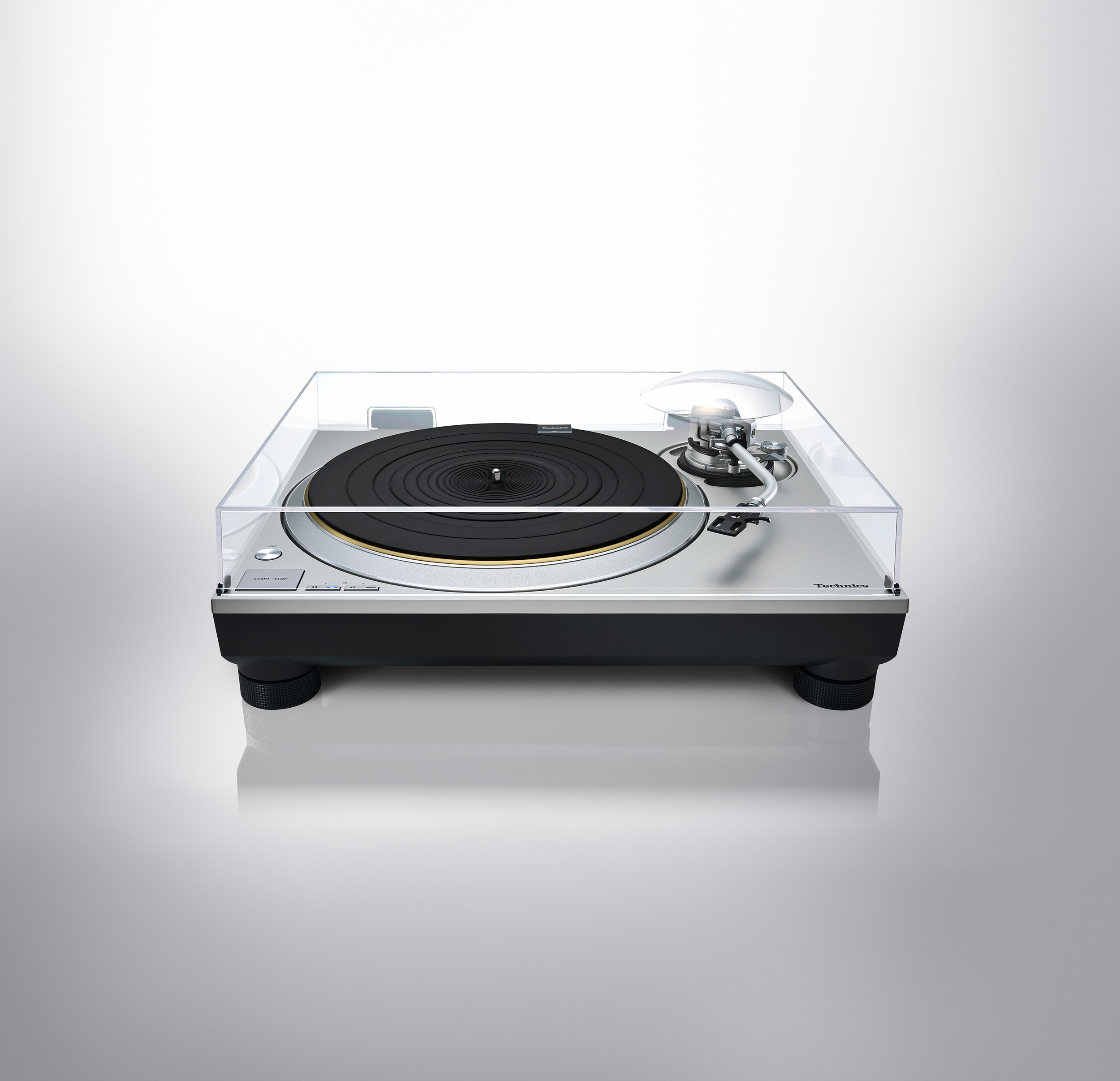 Technics New Generation Grand Class Turntable SL-1300G in silver with a dust cover