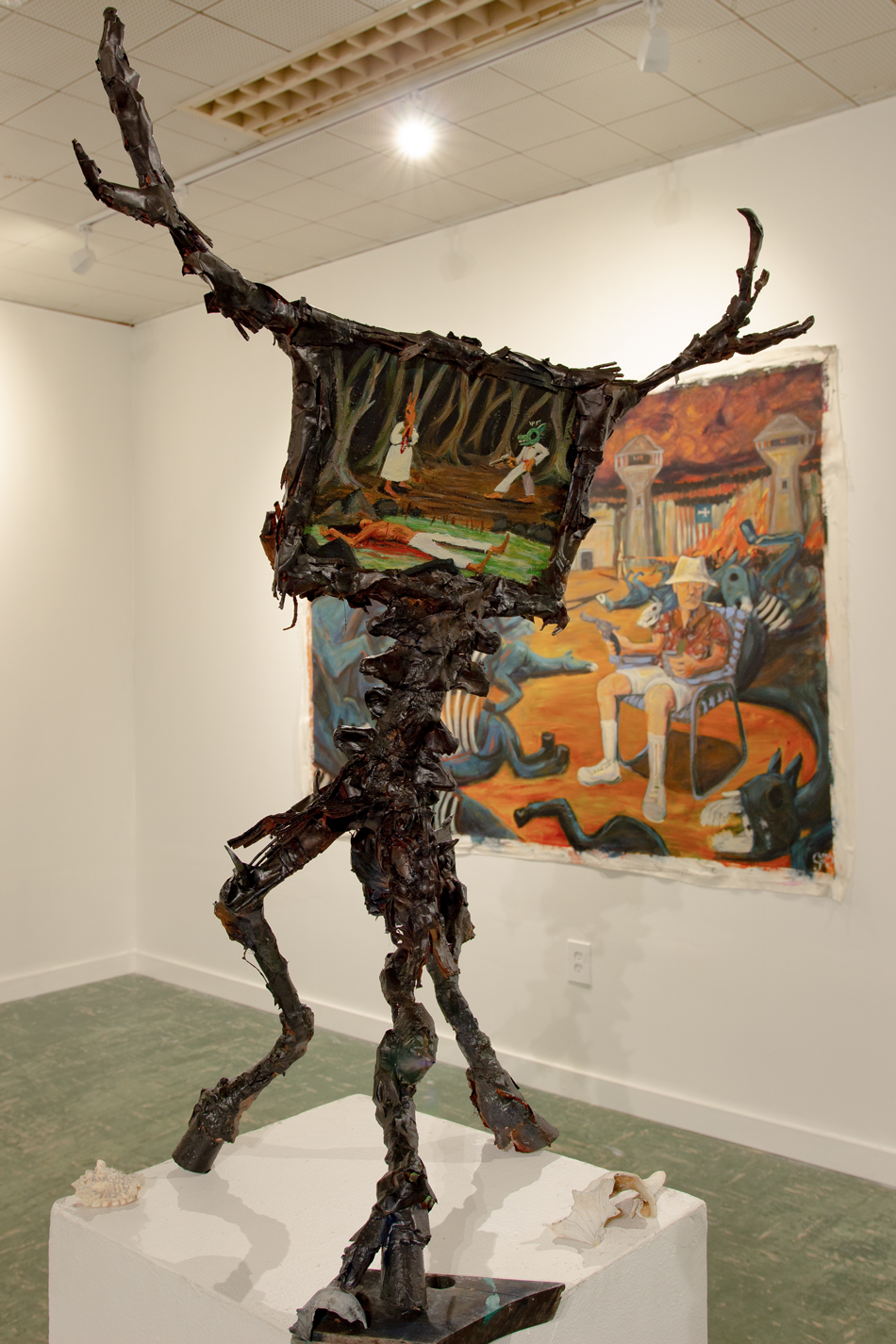 "Annihilation," is an experiment in creating a symbiotic relationship between my trash-based sculptures and my dream-based paintings. I wanted to create a creature than can act as a silent storyteller.

It is a mixed collage of found and sculpted mat