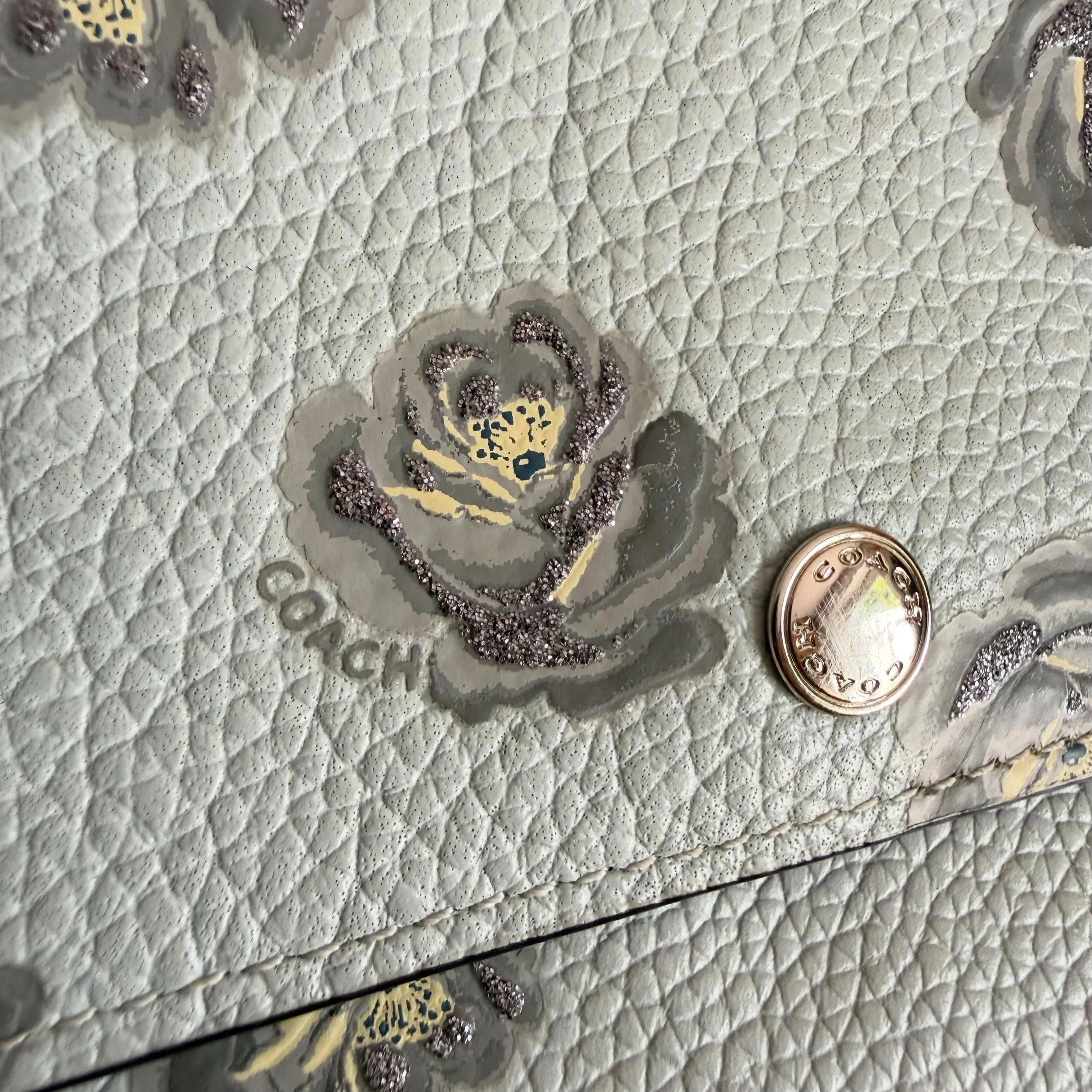 Rare Coach find!!
Sparkly rose print 
$95
.
.
$8 shipping continental US
Free shipping for purchases over $100
.
.
FOLLOW OUR BACKUP ACCOUNT: @seaagainconsignment
