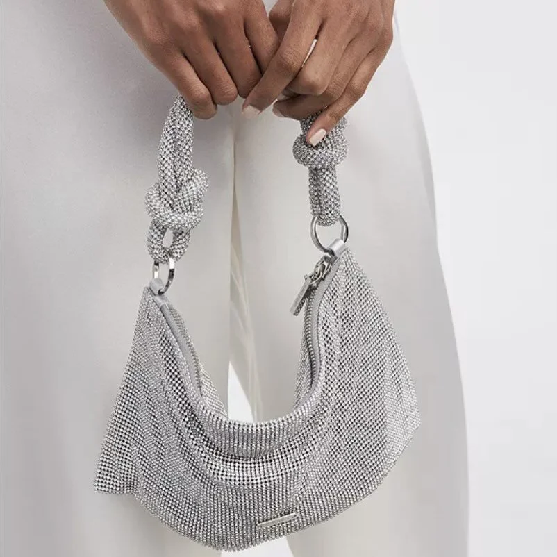 Cult Gaia Hera nano knotted silver evening bag 
$275
.
.
$8 shipping continental US
Free shipping for purchases over $100
.
.
FOLLOW OUR BACKUP ACCOUNT: @seaagainconsignment