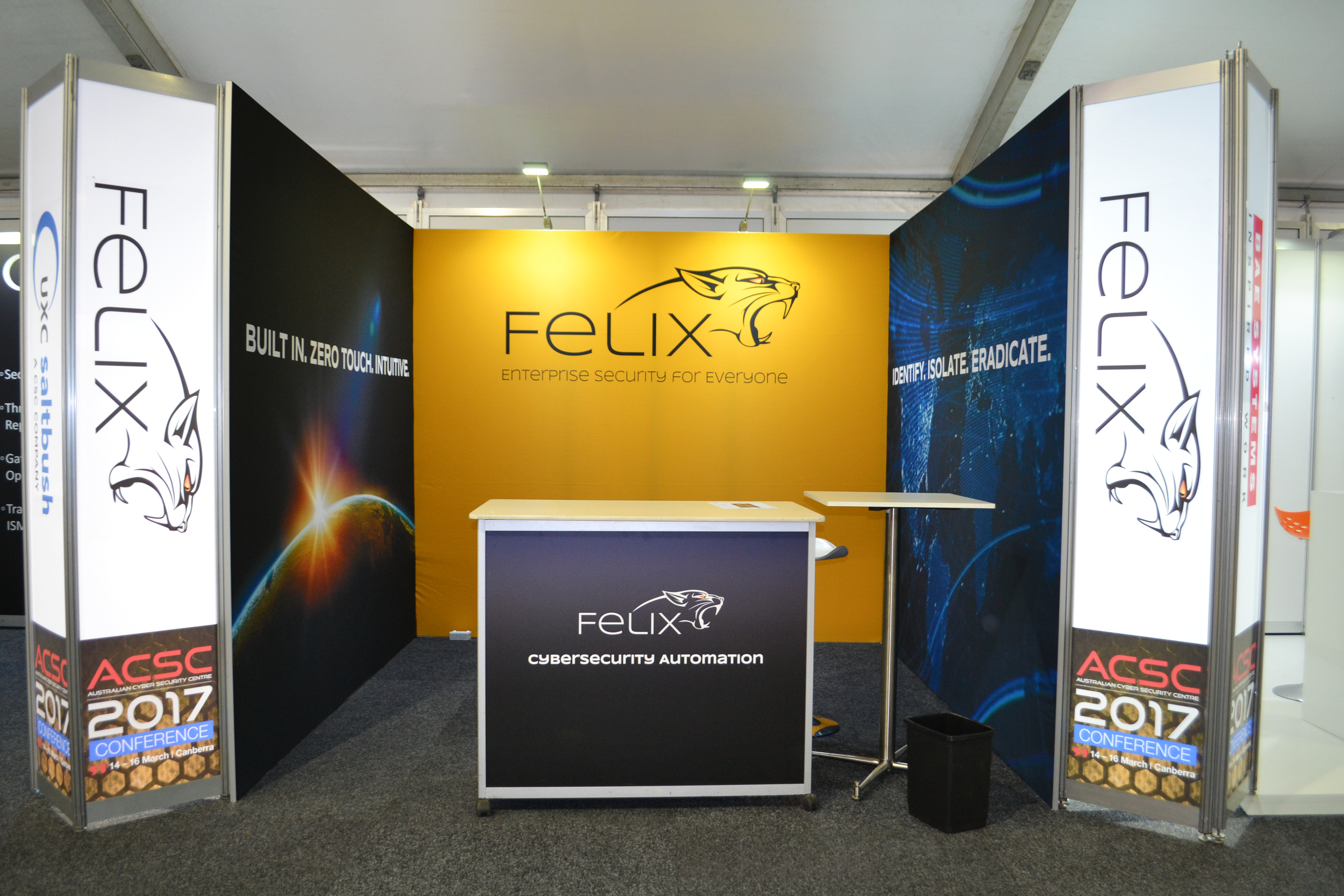 3x3 Octanorm with Reframe Banners & Backlit Vertical Fascias