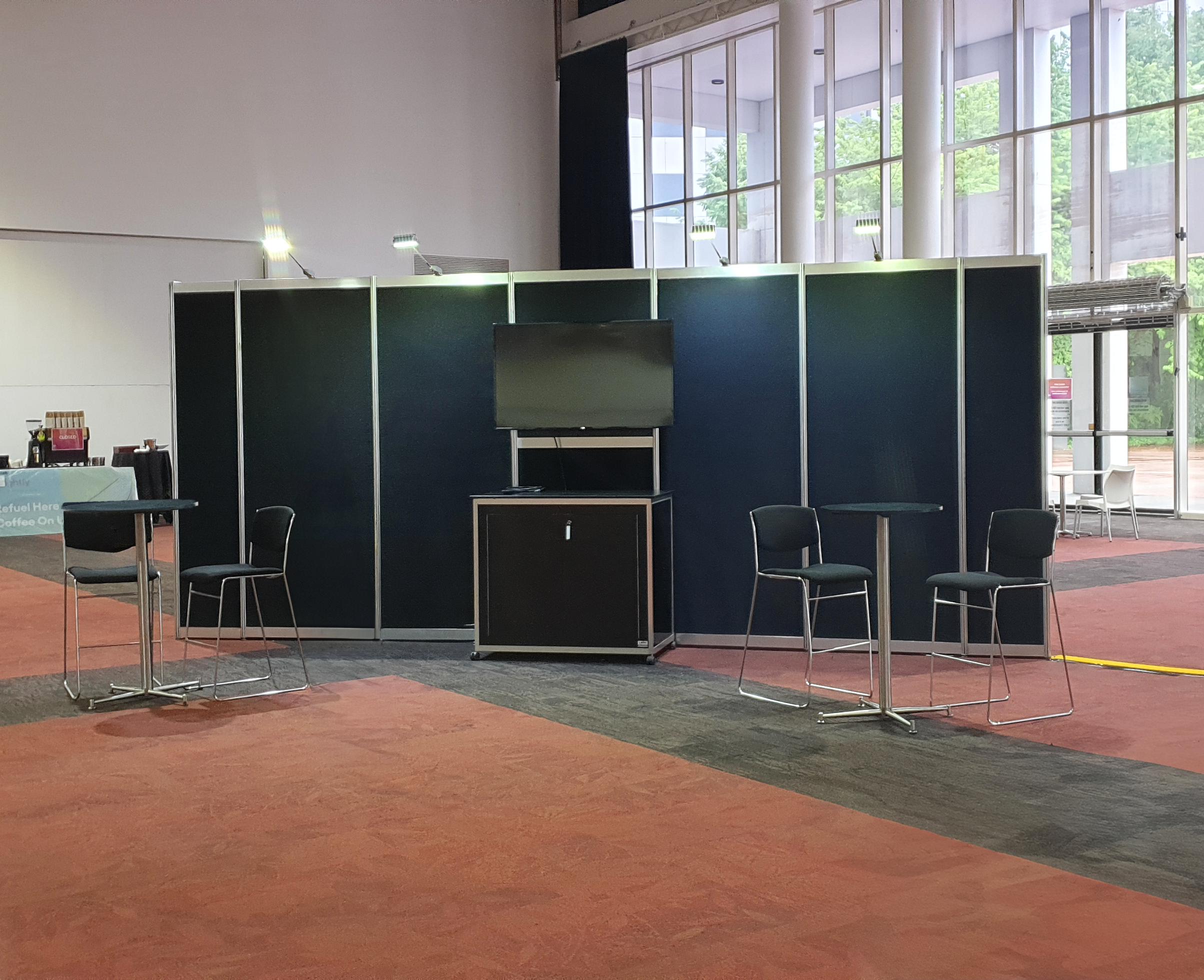 Octanorm Black Panel Cavity including AV & Furniture