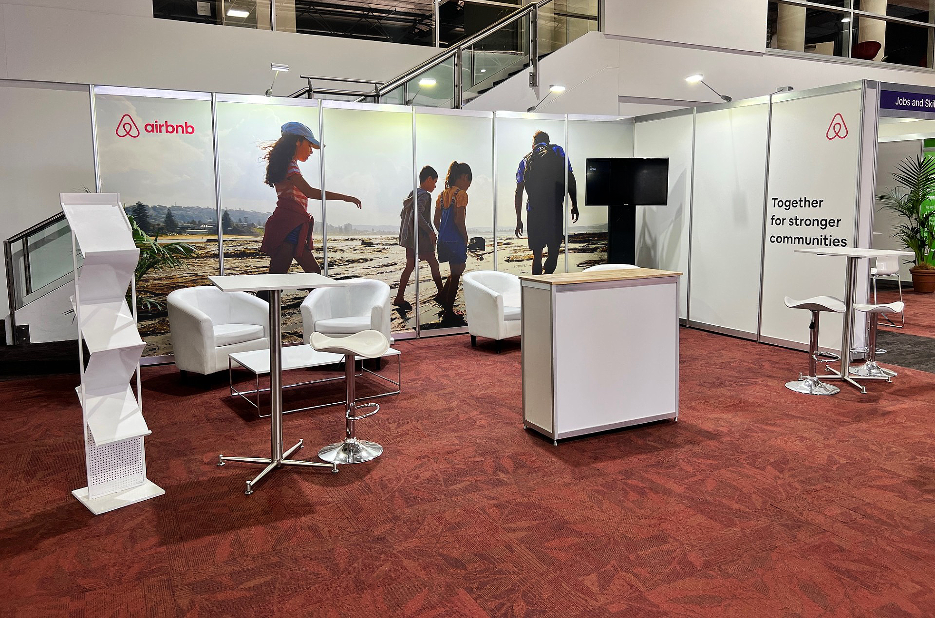 Airbnb Octonorm 6m x 3m Stand with Printed Graphics, Furniture & AV