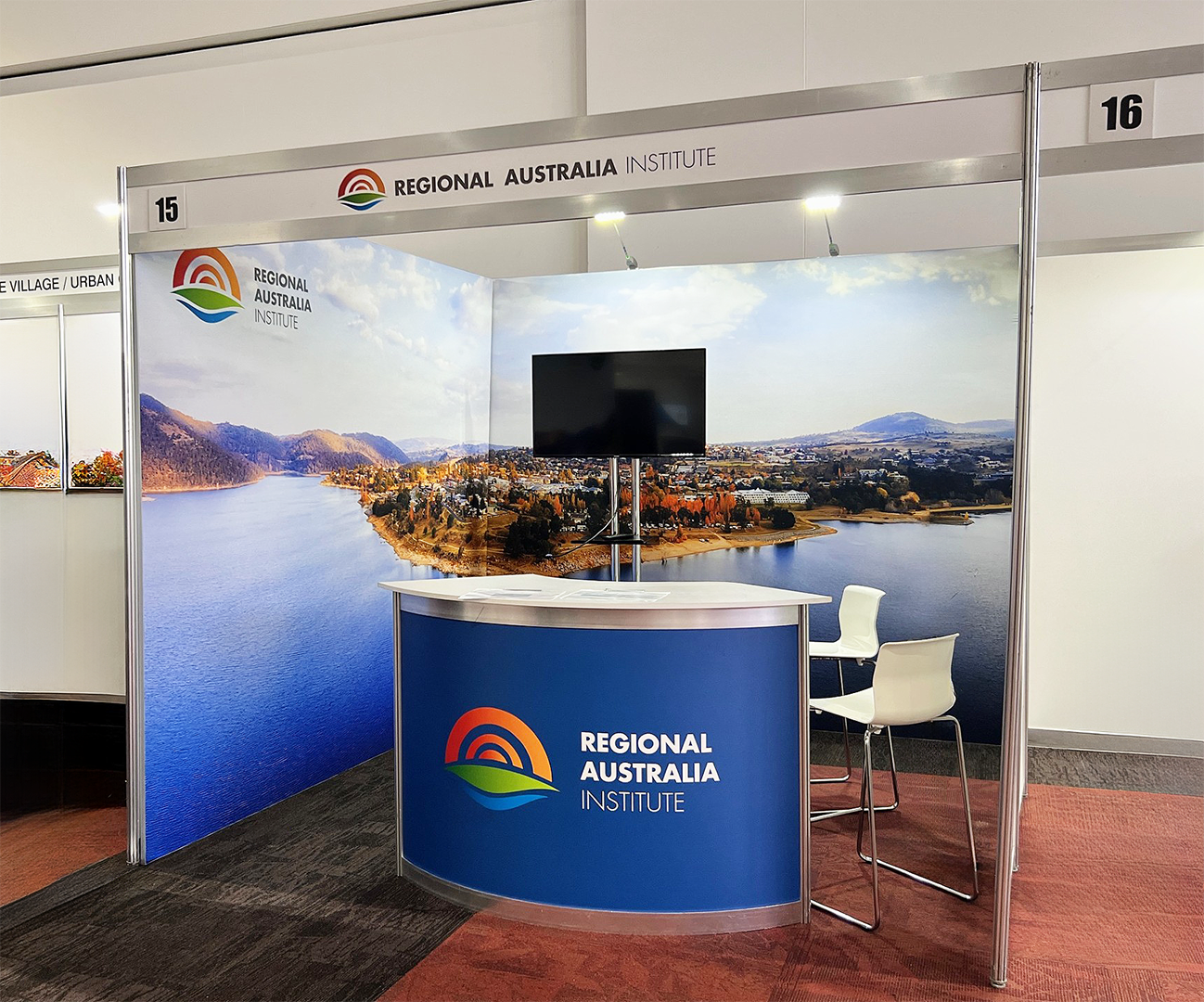 Octanorm 3m x 3m Booth with Reframe Banners & AV