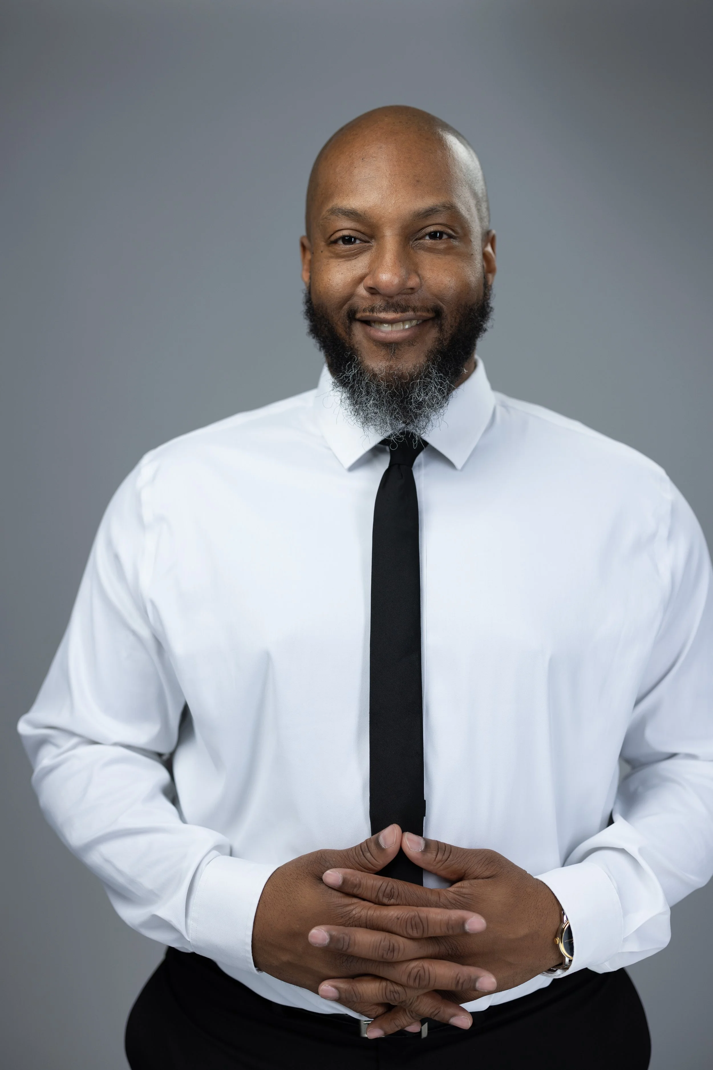 Kory Miles white shirt black tie