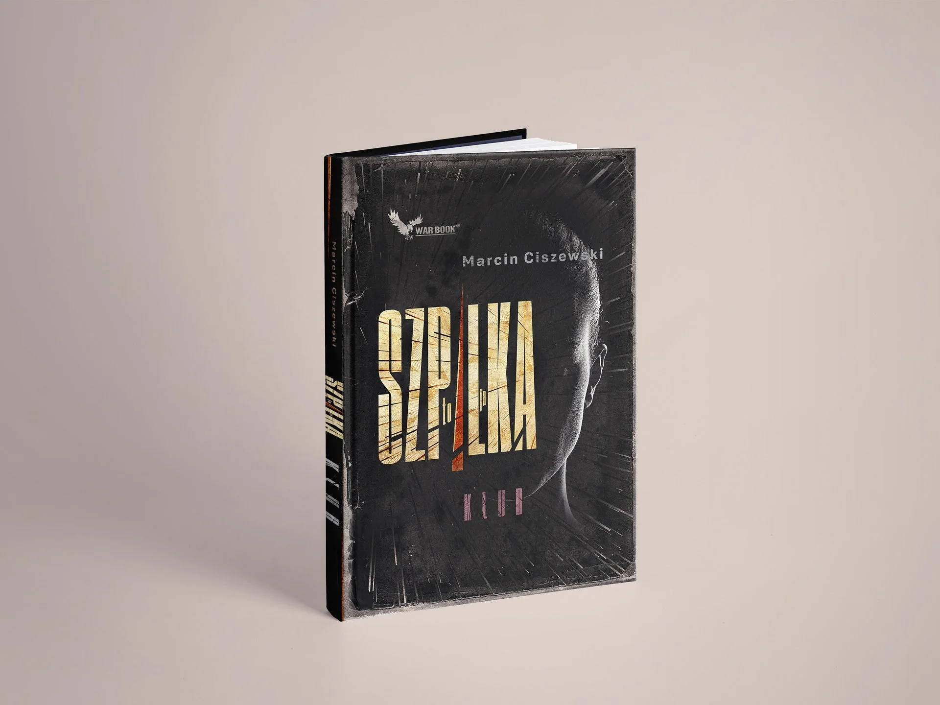 Book titled 'Hula' by Marcin Cisewski, featuring a black and white portrait with dramatic lighting, placed on a plain background.