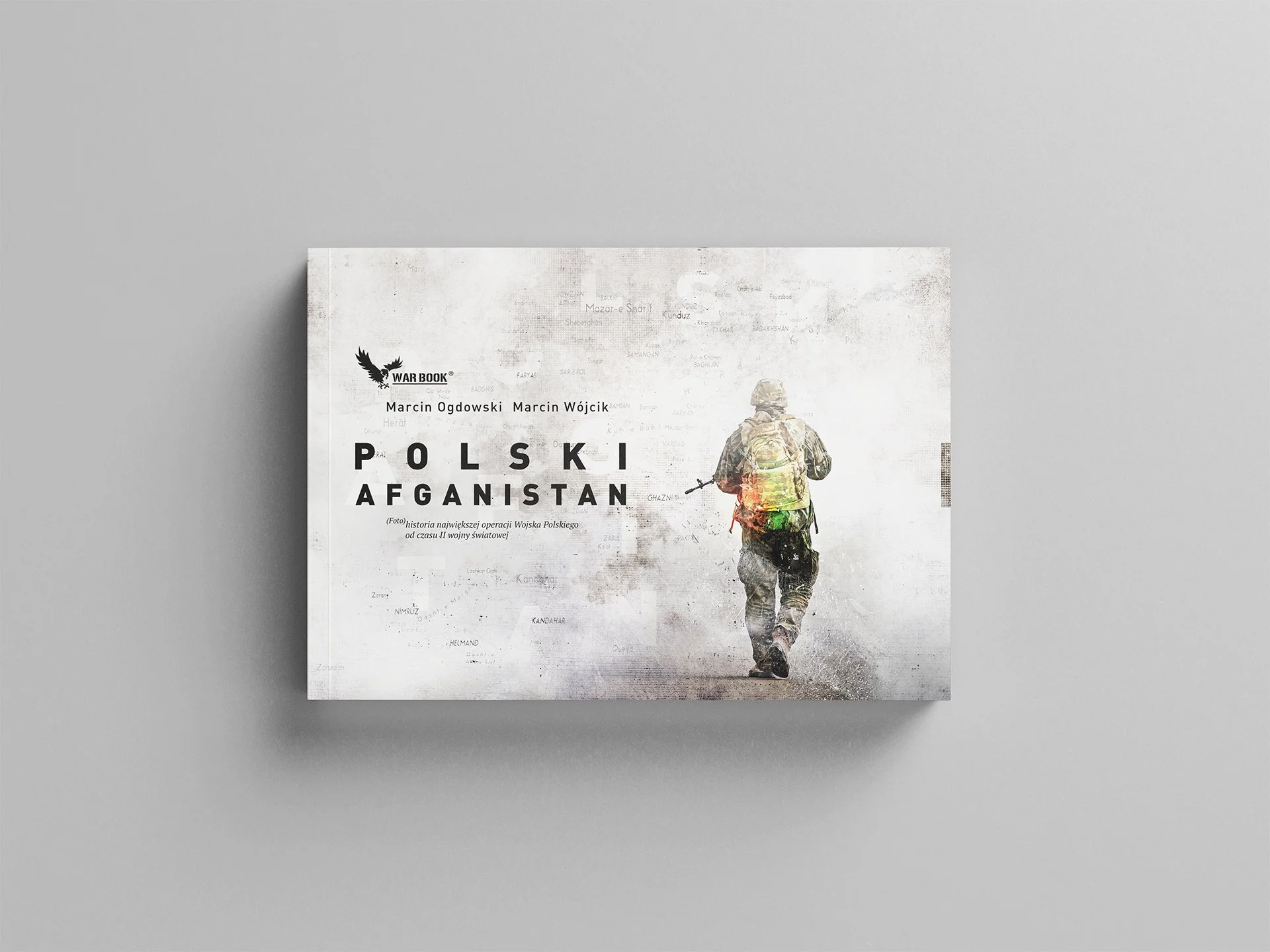 Book cover titled "Polski Afganistan" by Marcin Ogdowski and Marcin Wójcik, featuring a soldier walking away in military gear.