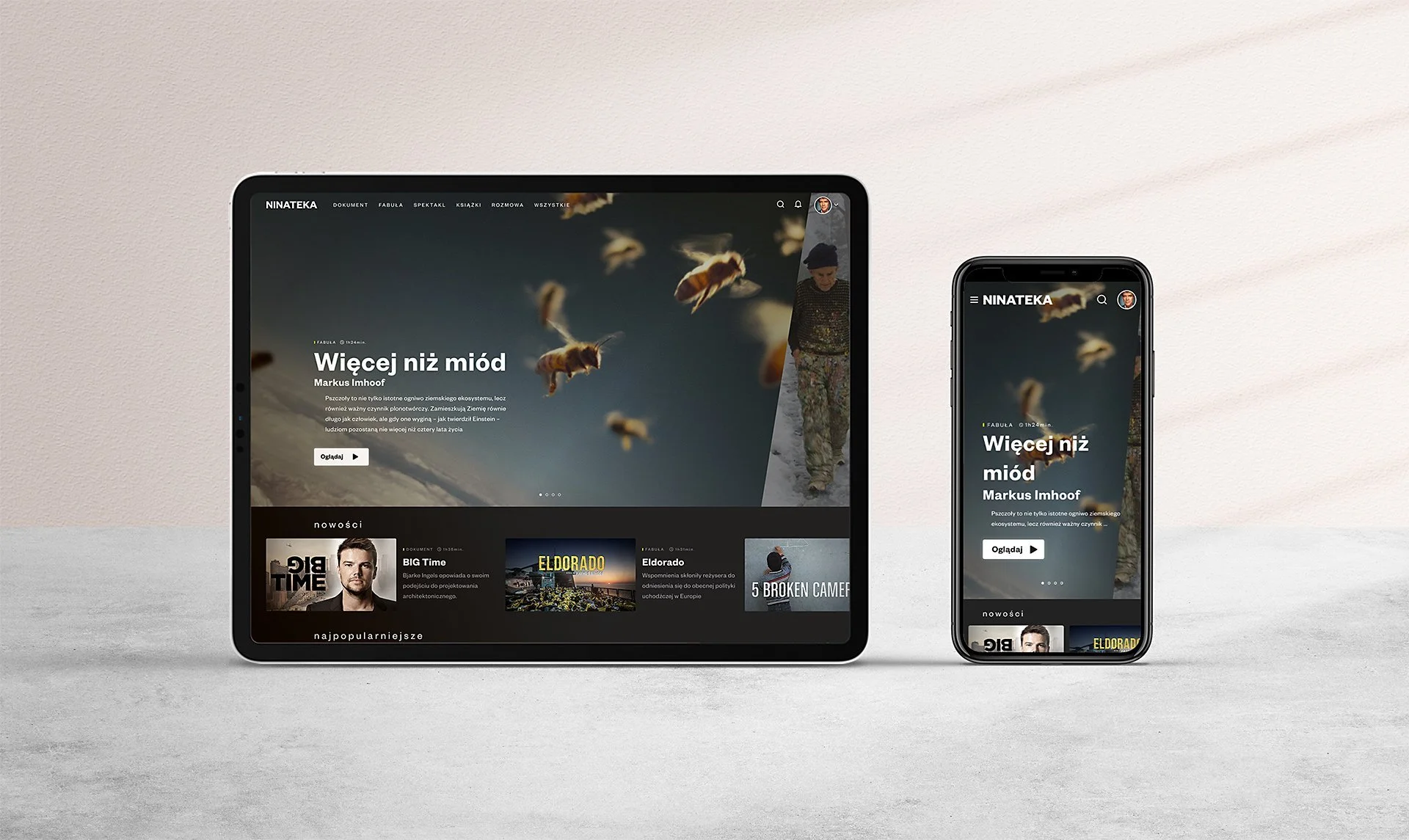 A computer and smartphone displaying the same website with a background image of bees flying against a blue sky and a woman walking on a path.