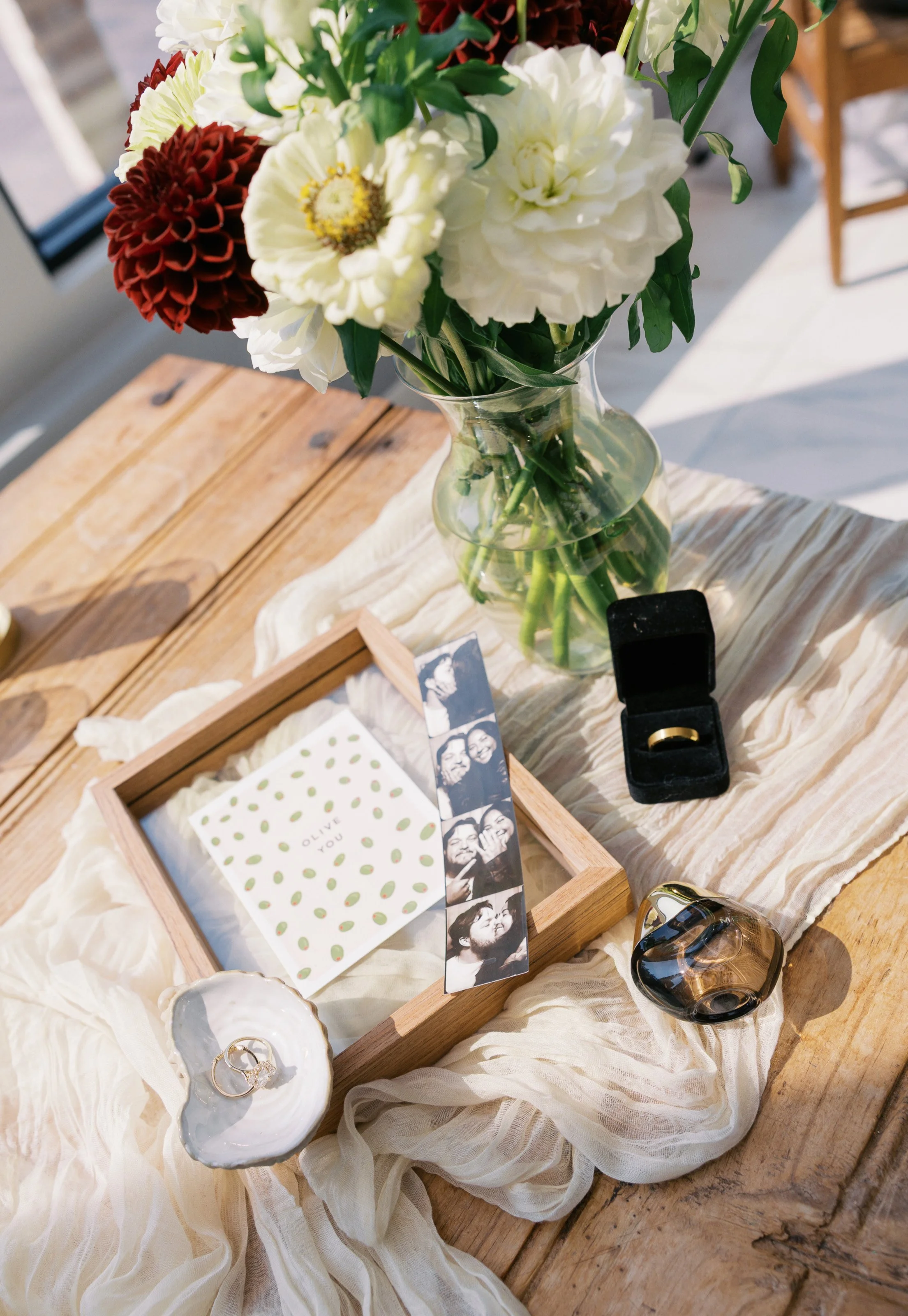 Romantic indoor reception setup at Bridle Woods Event Centre featuring candlelit tablescapes, soft linens, and modern floral details in an elegant countryside wedding setting in Chilliwack BC.
