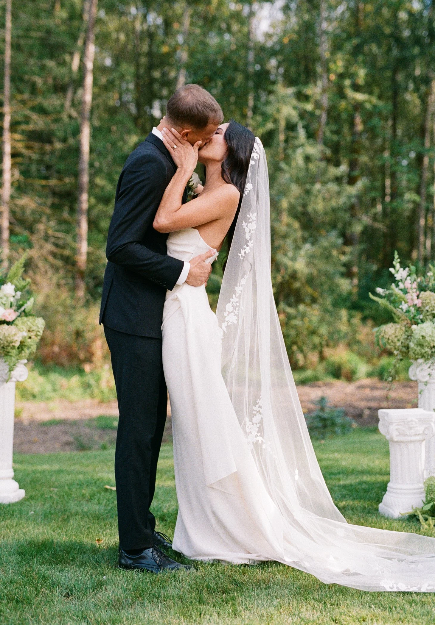 Bride and groom portrait at modern luxury backyard wedding in Langley BC featuring elegant garden setting and editorial film and digital photography