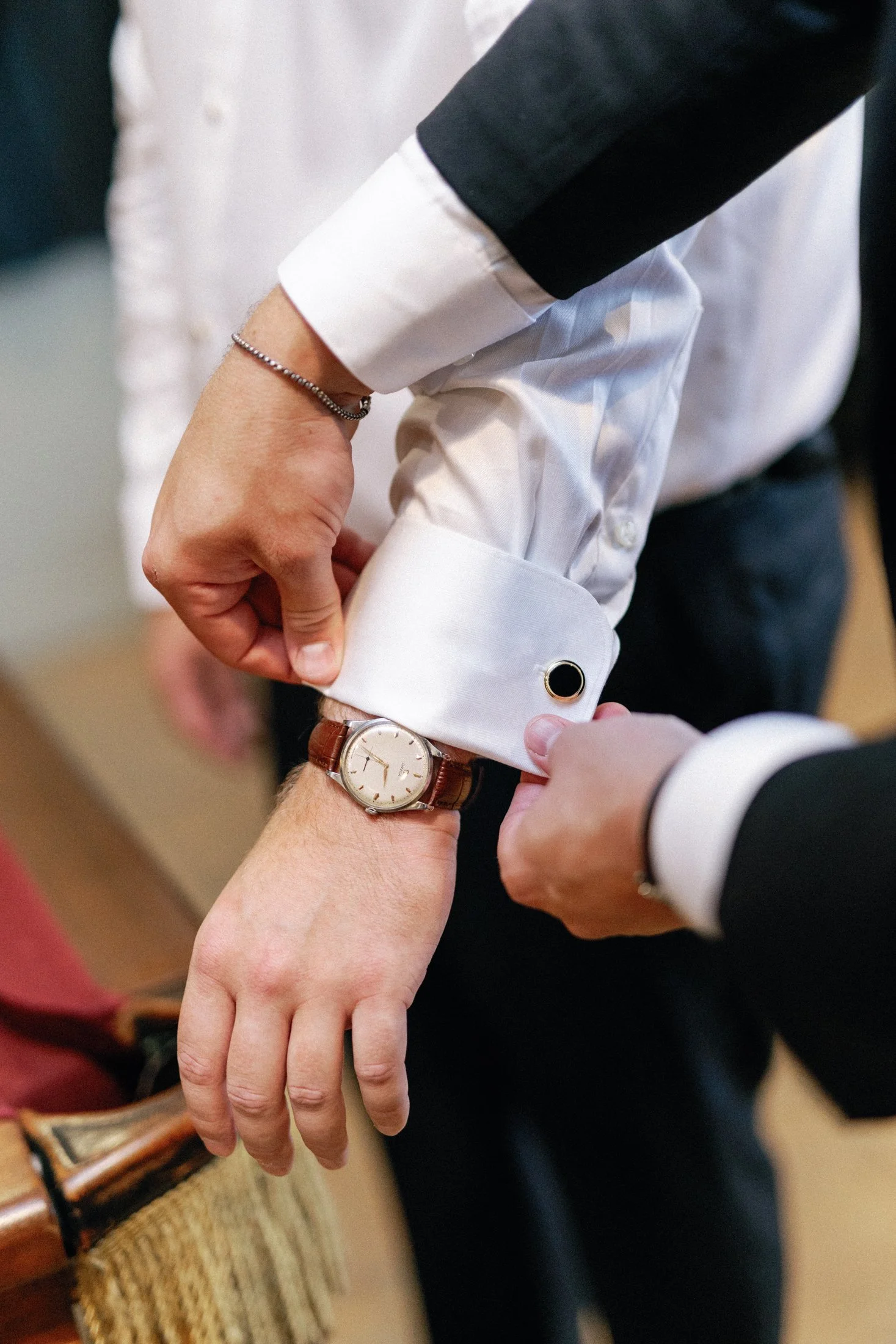 Classic groom getting ready photos at Fraser River Lodge including flat lay wedding detail styling, captured with hybrid film and digital wedding photography for an authentic editorial feel.