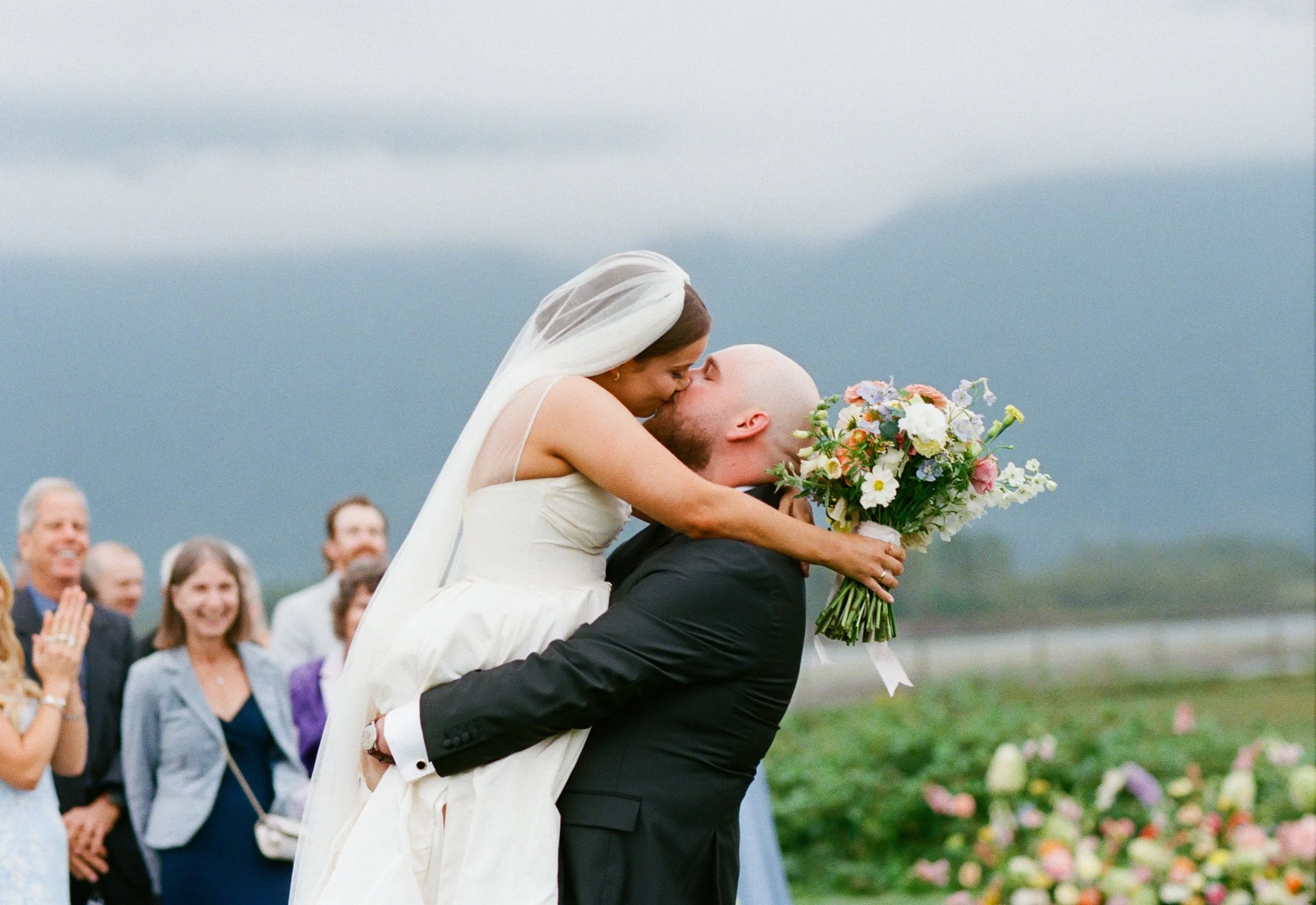 Outdoor wedding ceremony at Fraser River Lodge including processional, ceremony details, guest tears and joyful cheers, photographed by Julia Hindy Photography on film and digital cameras.