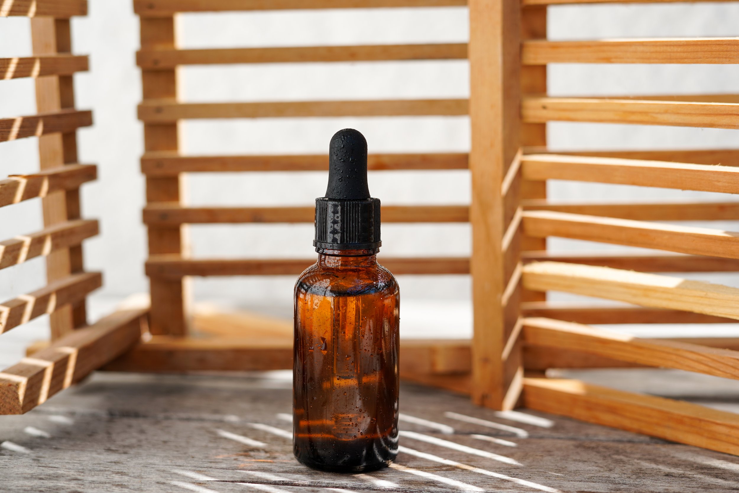 glass-bottle-mock-up-cosmetic-oil-bottle-with-sha-2023-11-27-05-10-29-utc.jpg