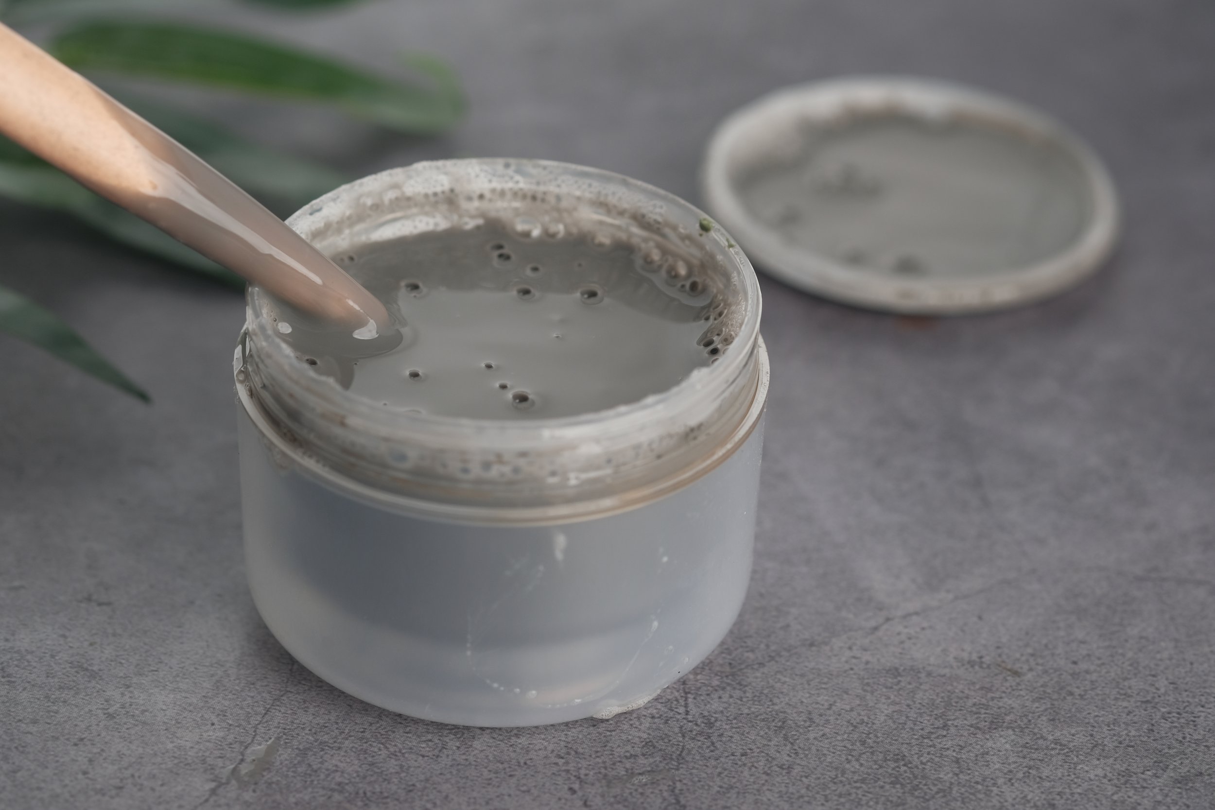 bubble-clay-mask-in-container-on-black-background-2023-11-27-05-12-30-utc (1).jpg