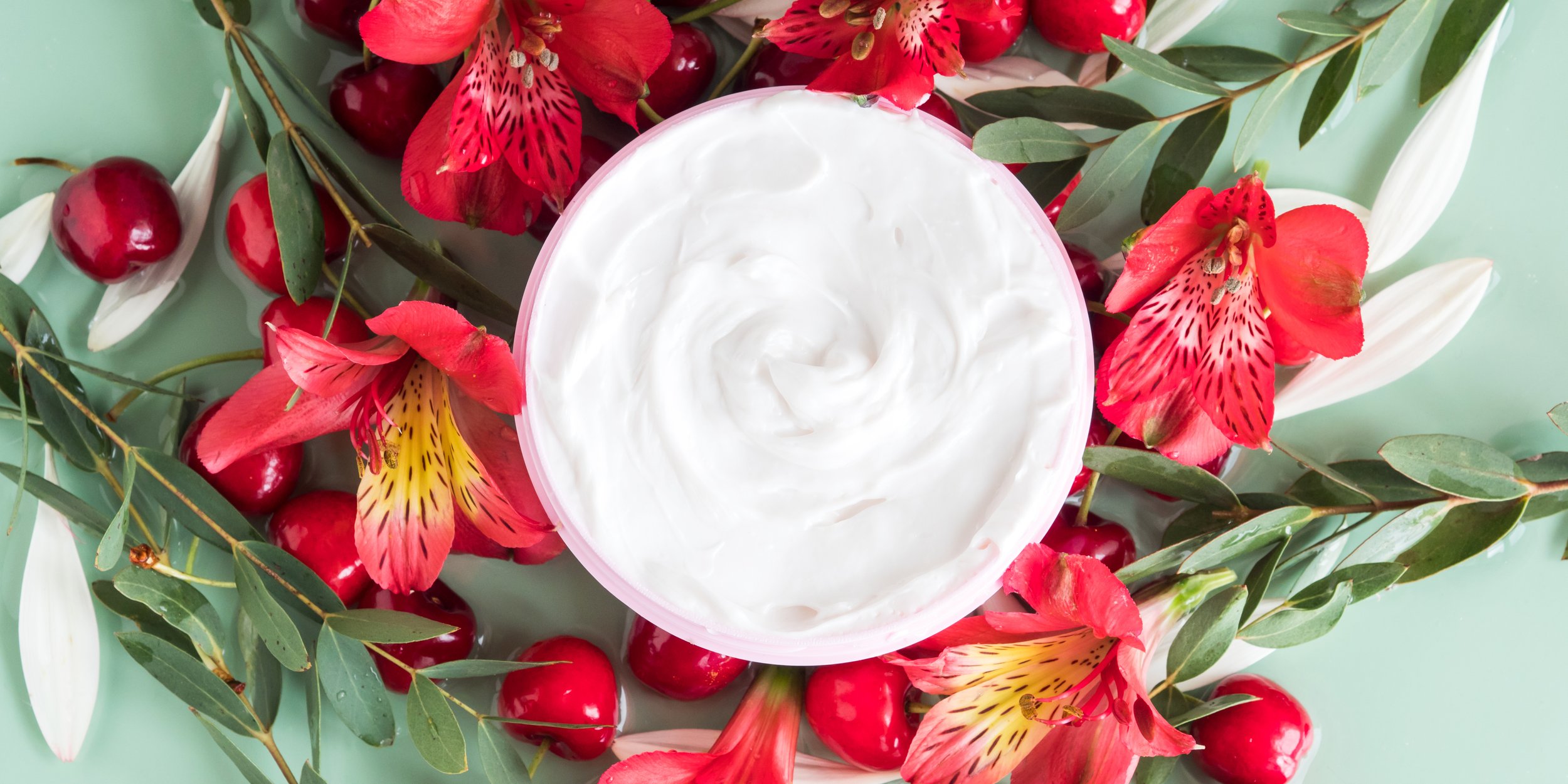 skin-care-flat-lay-with-open-generic-cream-jar-wit-2023-11-27-05-31-08-utc.jpg