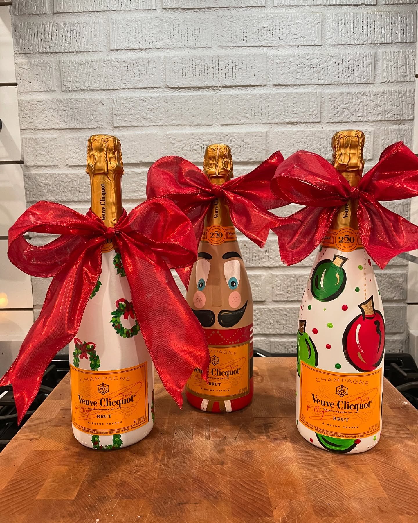 If you have been following me for a while you know I paint bottles during the holidays so&hellip;.

*cue Mariah Carey*  It&rsquo;s timeeeeeeeee! 

Lamarca - $135
Veuve Orange - $185
Veuve Pink - $195
Moet - $150

We are currently running on a 2 week 