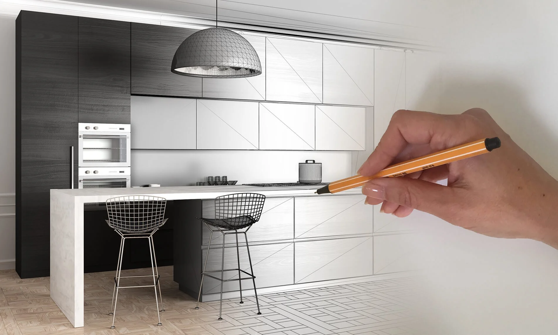 A modern kitchen with black and white cabinets, a white island, and black wire chairs, with a hand drawing on the image with an orange pen.