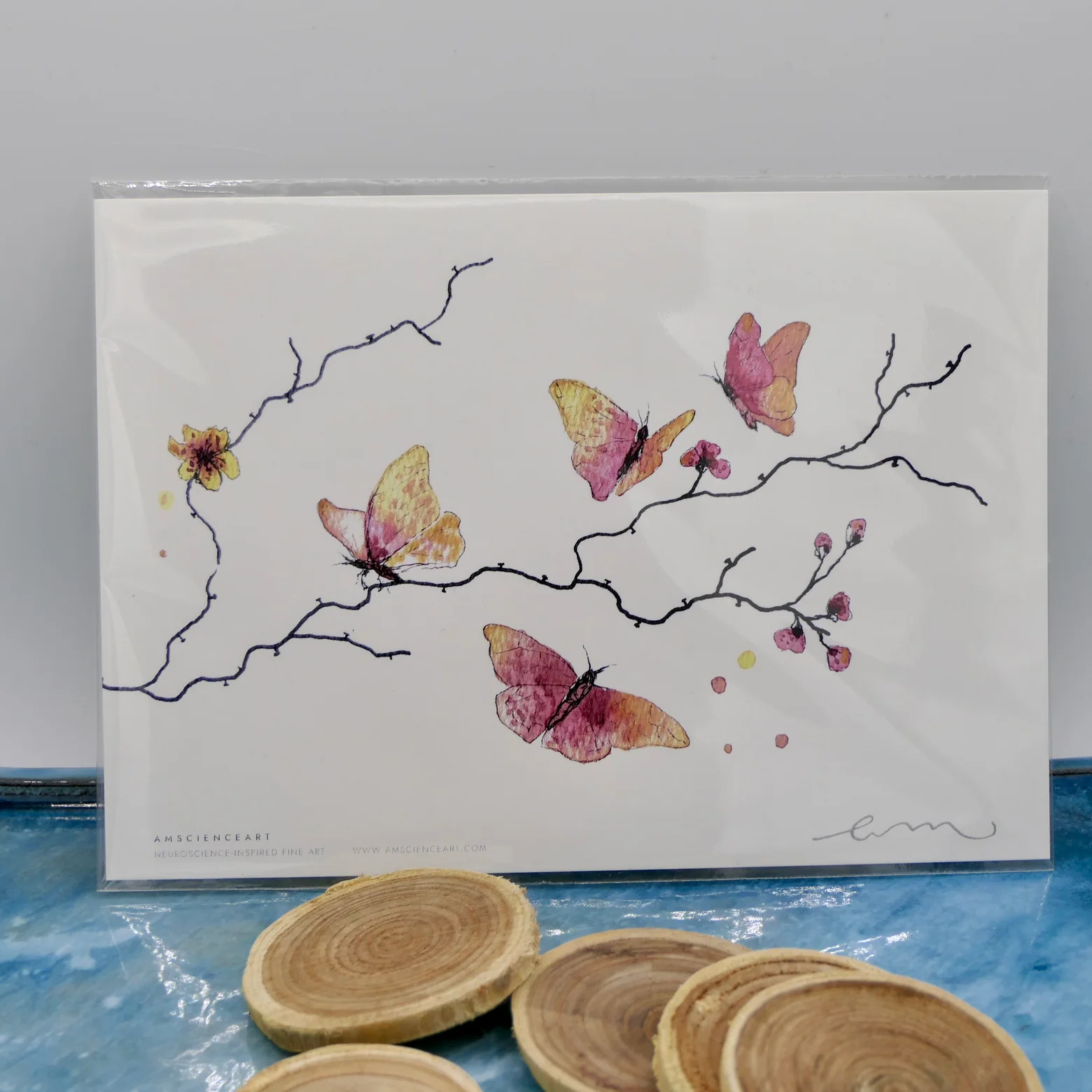 Butterfly and neuron art print displayed at Artistic Square in Aarhus.
