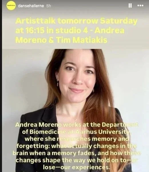 A woman with long reddish-brown hair, wearing a black blazer, smiling at the camera. Overlaid yellow text announces an artist talk tomorrow at 4:15 PM in studio 4 with Andrea Moreno and Tim Matiakis, discussing memory, forgetting, and brain changes.