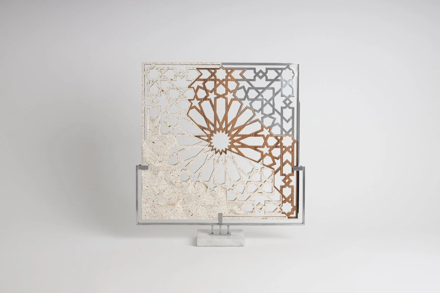 Decorative Moroccan-style metal and wood screen with geometric patterns on a white background.