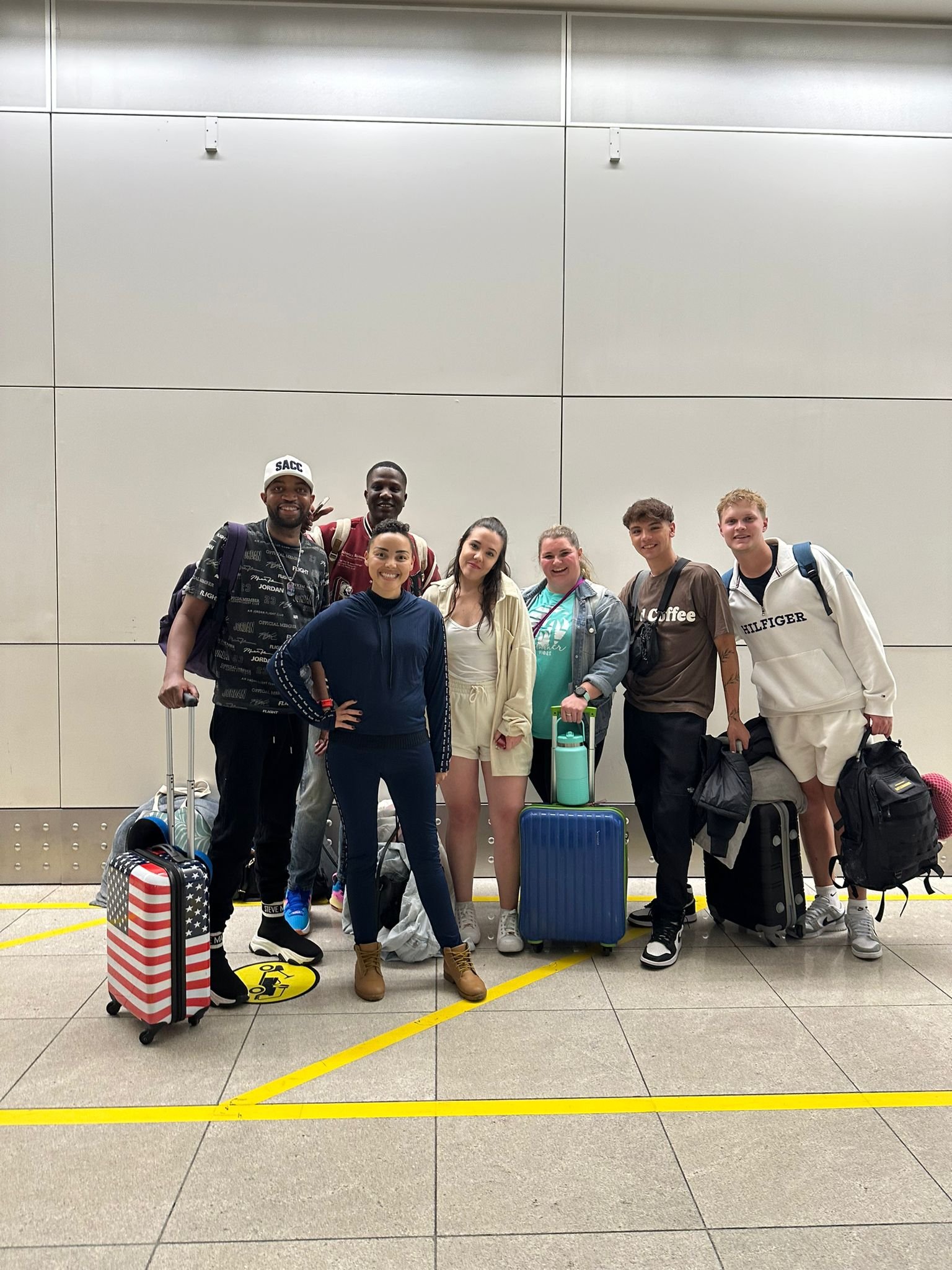 Team St. Andrews in Dubai waiting for connection to Miami.jpg