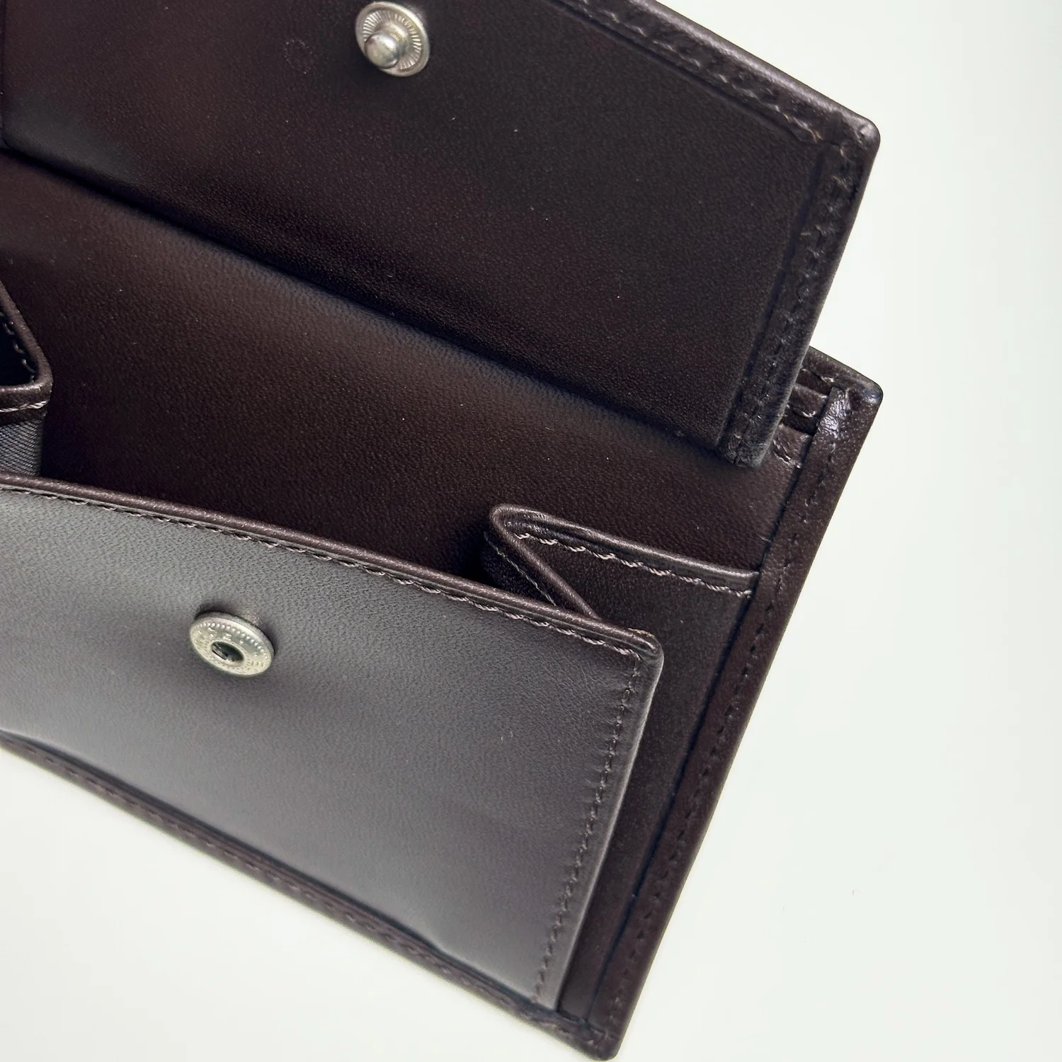 Patek Philippe Brown Leather Bifold Wallet with Embossed Logo