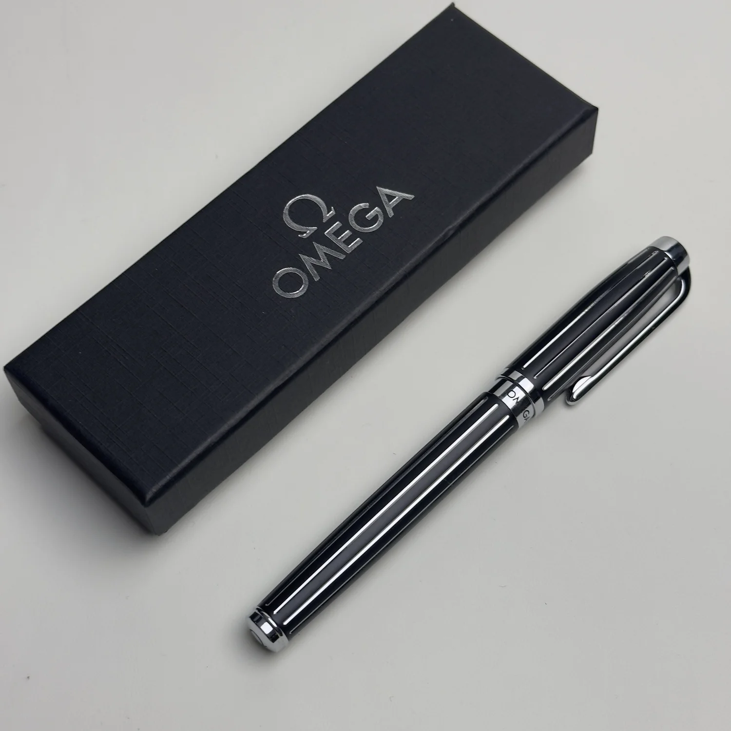 Omega Black Lacquer Ballpoint Pen with Chrome Accents – Luxury 