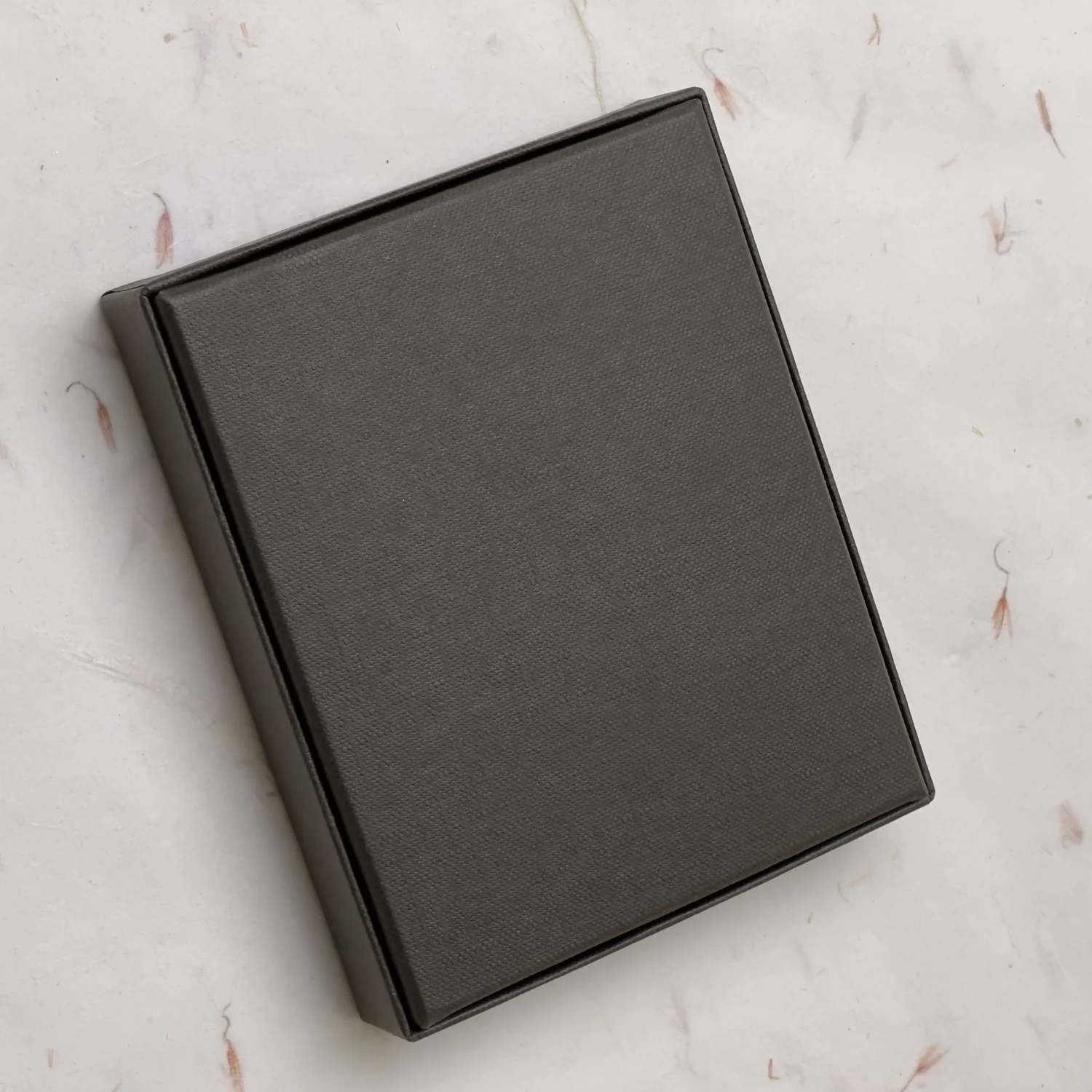 Patek Philippe Brown Leather Bifold Wallet with Embossed Logo