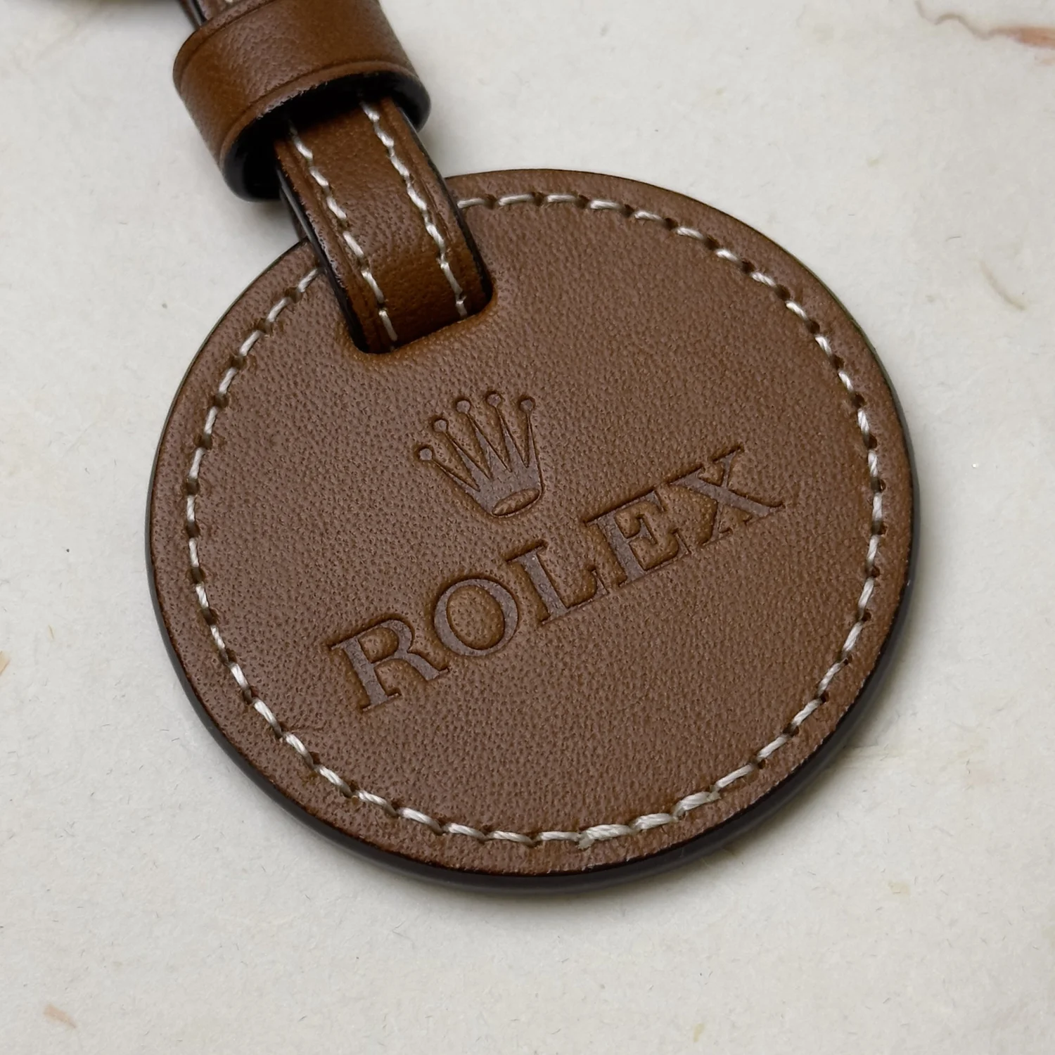 Rolex Brown Leather Keychain - the iconic Rolex logo embossed