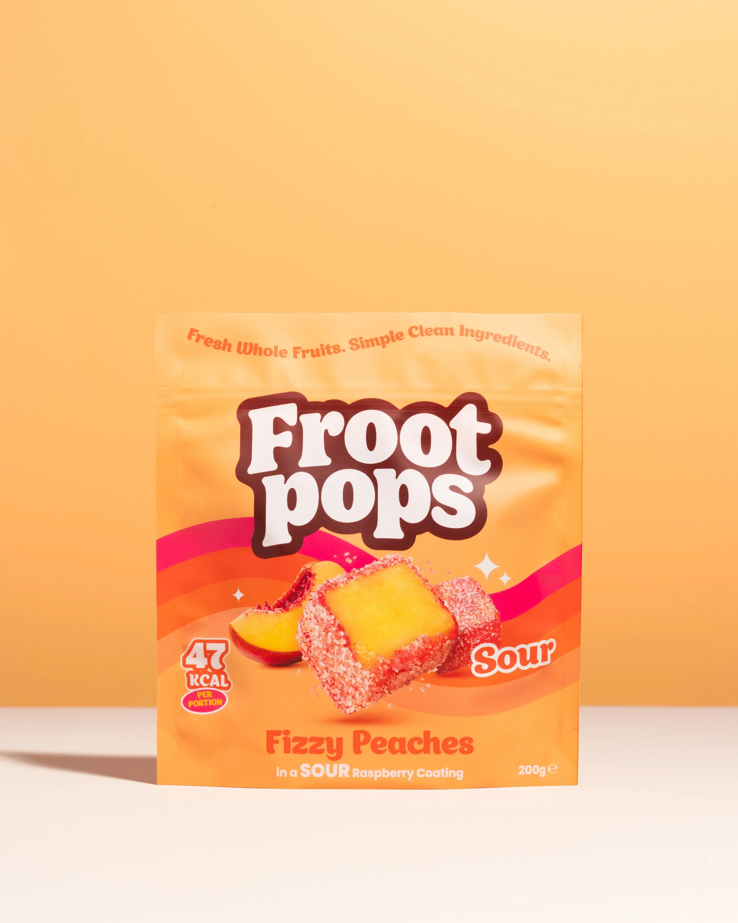 Froot Pops fizzy peaches in a sour raspberry coating