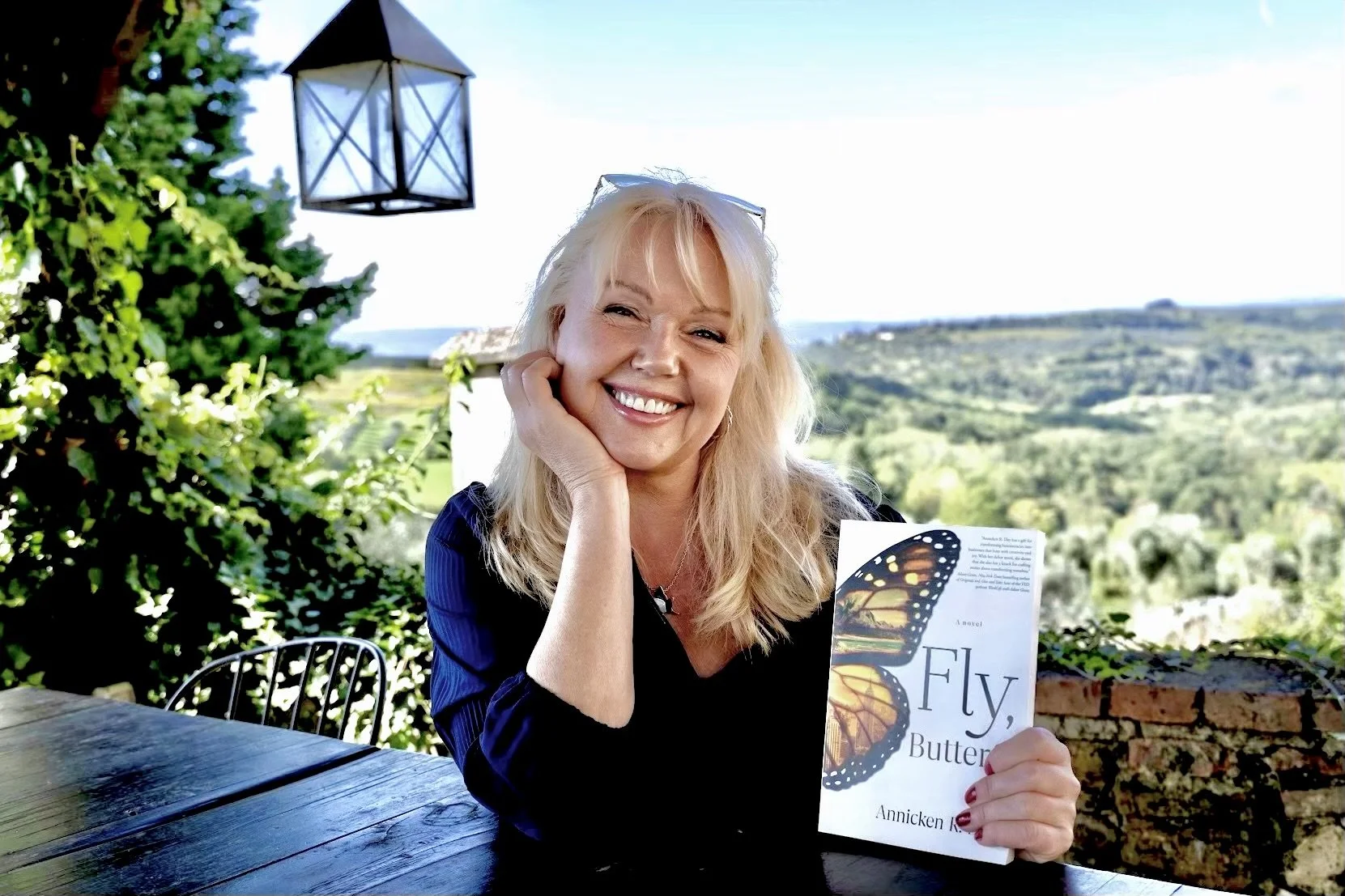 Annicken R. Day, author of the novel "Fly, Butterfly" sitting in her home in Tuscany, Italy.