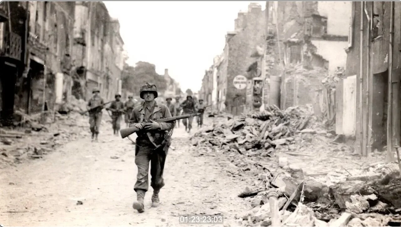 Soldiers walking through a war-torn city street with destroyed buildings and rubble.