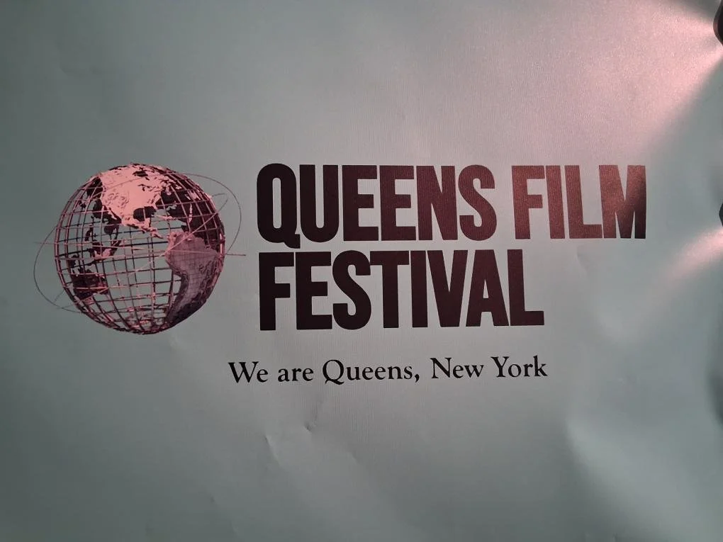 Queens Film Festival logo with a globe and the text "QUEENS FILM FESTIVAL" and "We are Queens, New York".
